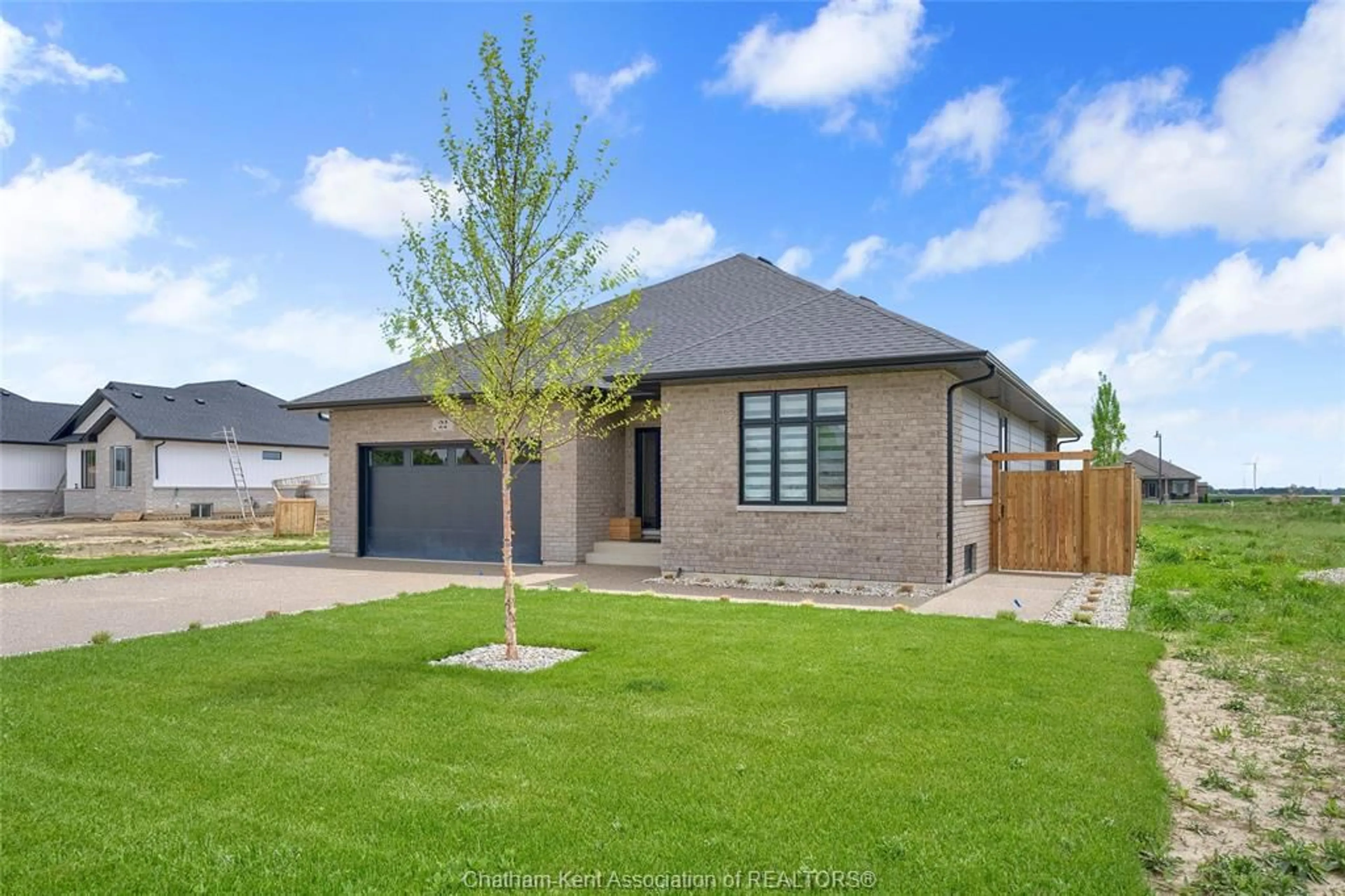 Home with brick exterior material, street for 211 Rosewood Cres, Chatham Ontario N7M 0V4