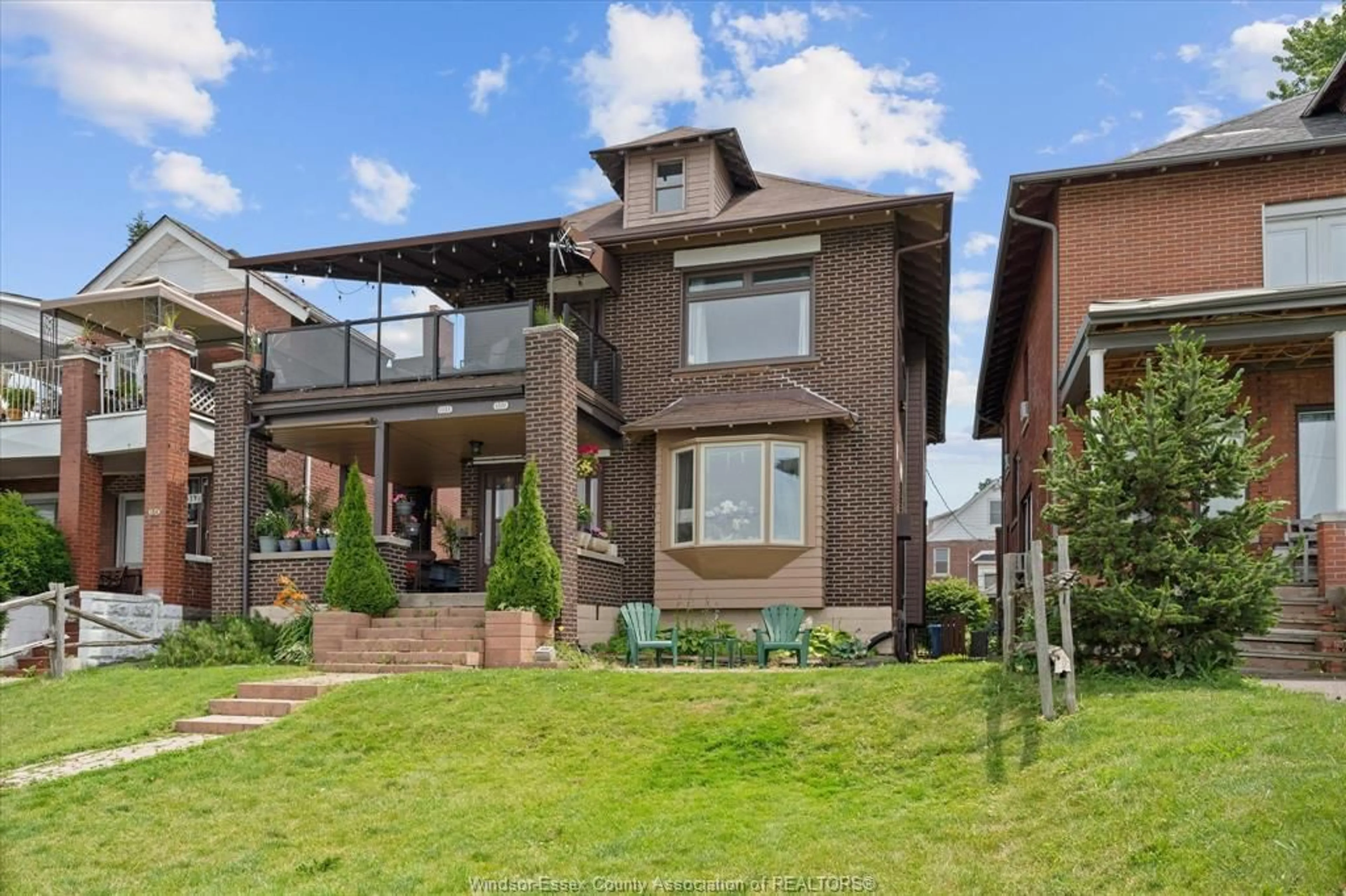 Home with brick exterior material, street for 1331 RIVERSIDE Dr, Windsor Ontario N9A 2T8