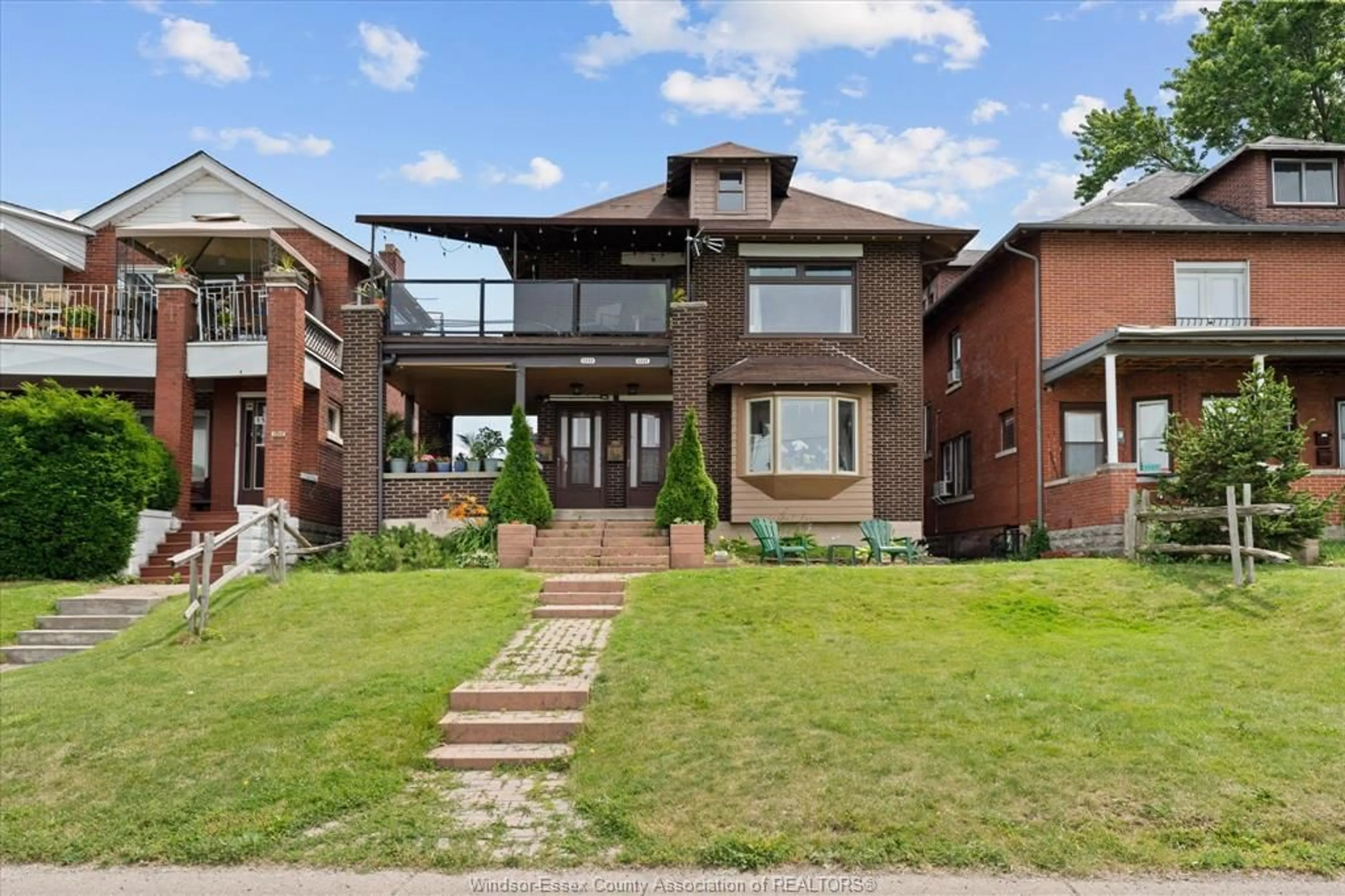 Home with brick exterior material, street for 1331 RIVERSIDE Dr, Windsor Ontario N9A 2T8