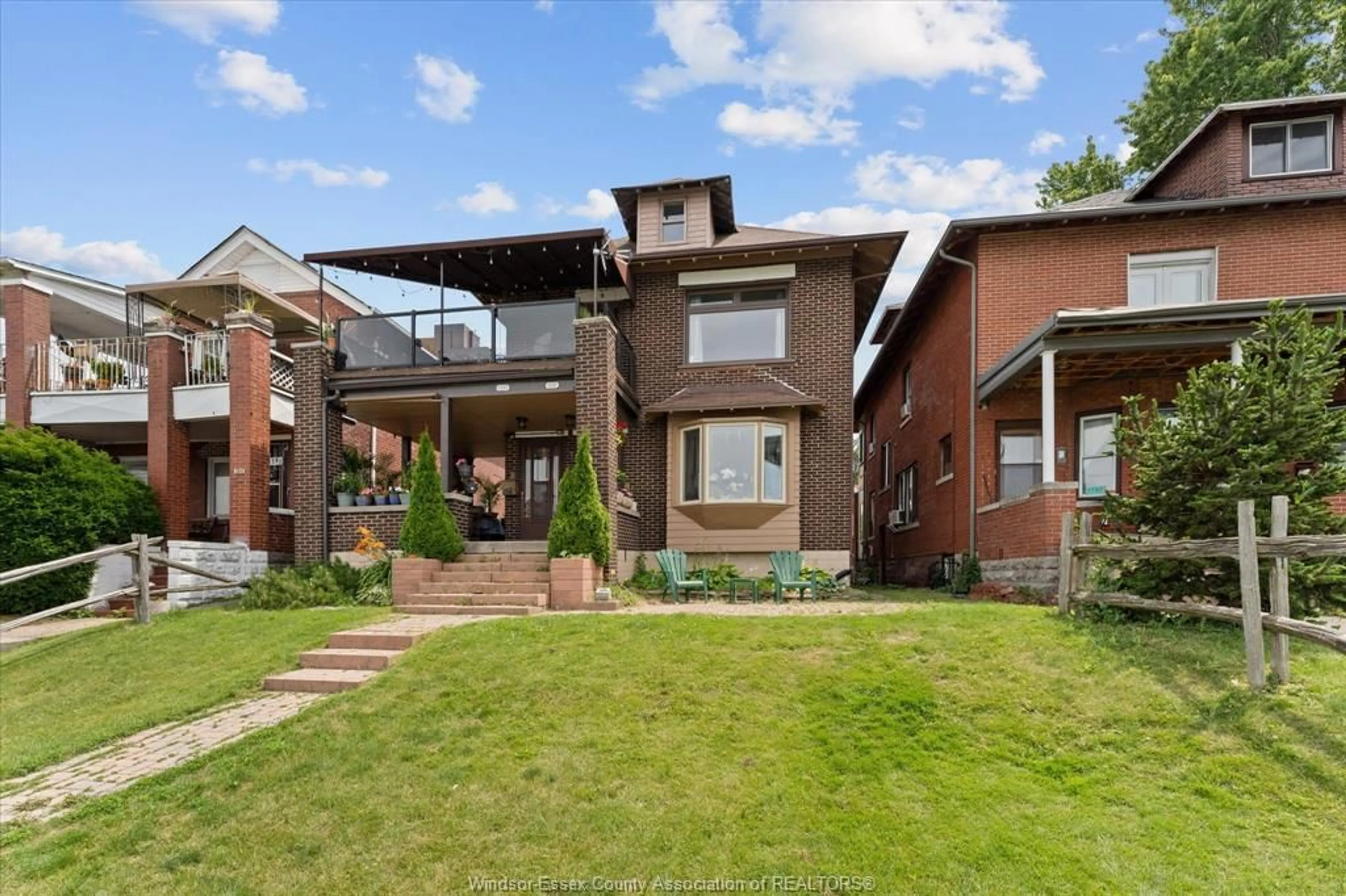Home with brick exterior material, street for 1331 RIVERSIDE Dr, Windsor Ontario N9A 2T8