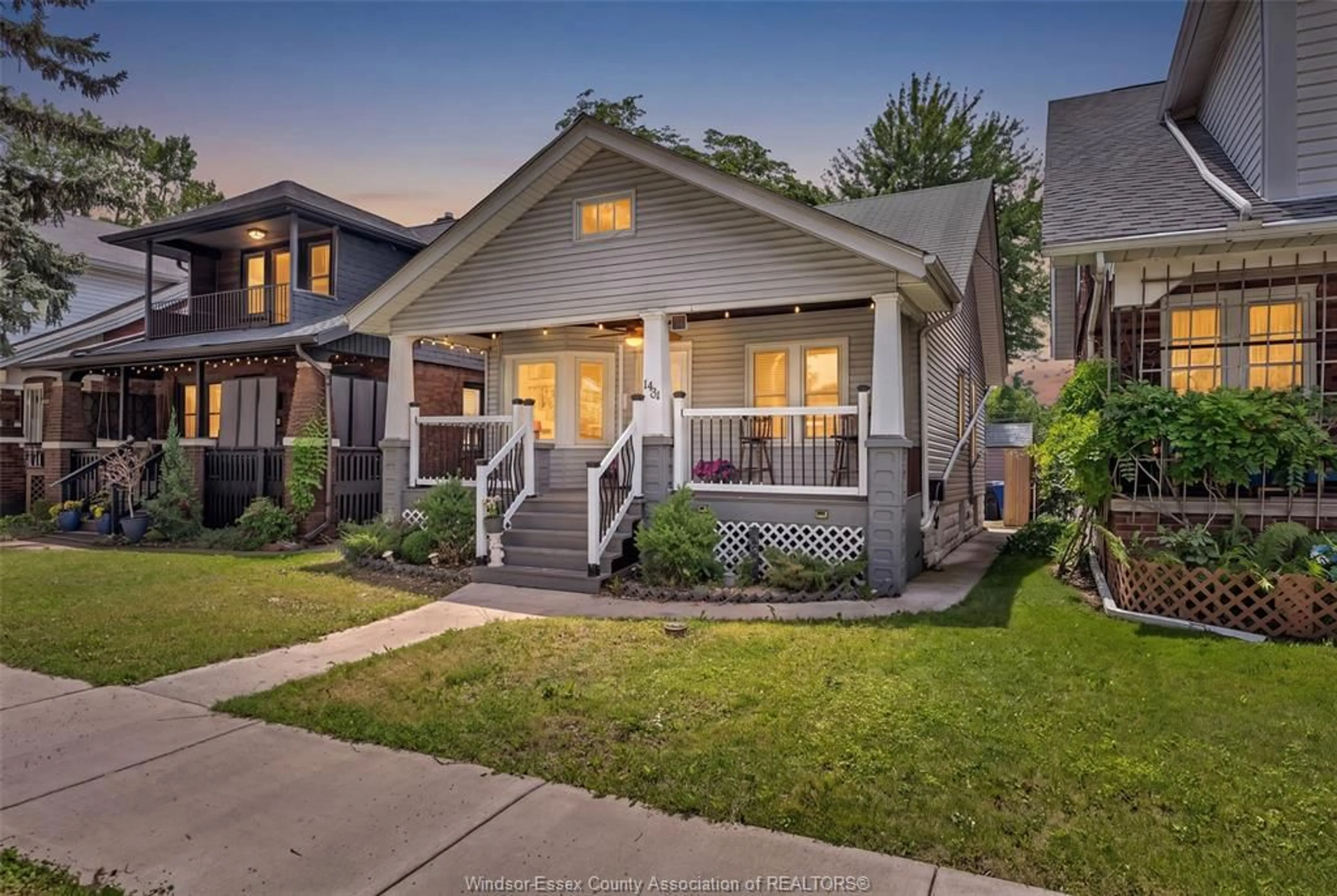 Home with vinyl exterior material, street for 1431 Langlois, Windsor Ontario N8X 4L9