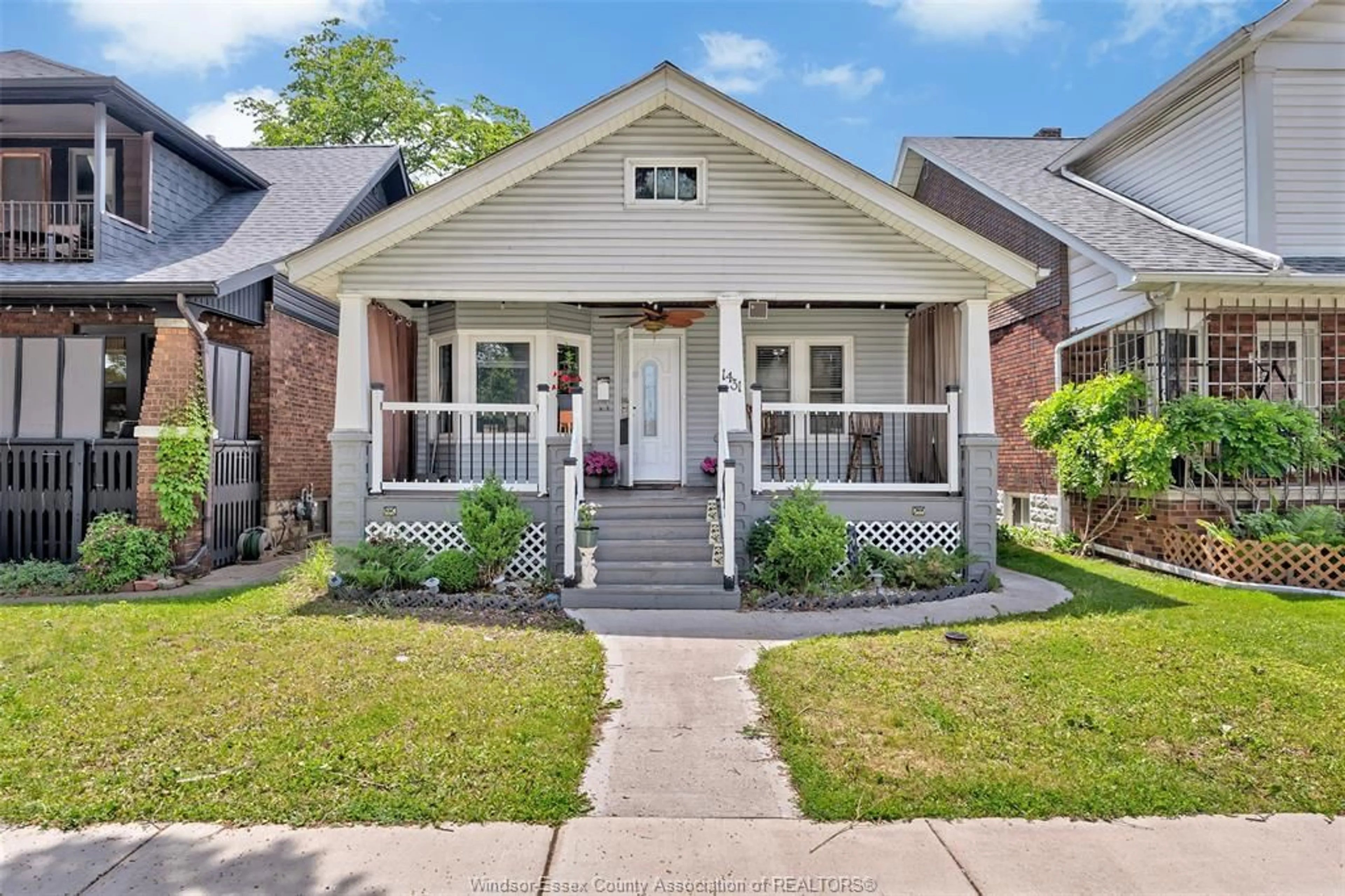 Home with brick exterior material, street for 1431 Langlois, Windsor Ontario N8X 4L9