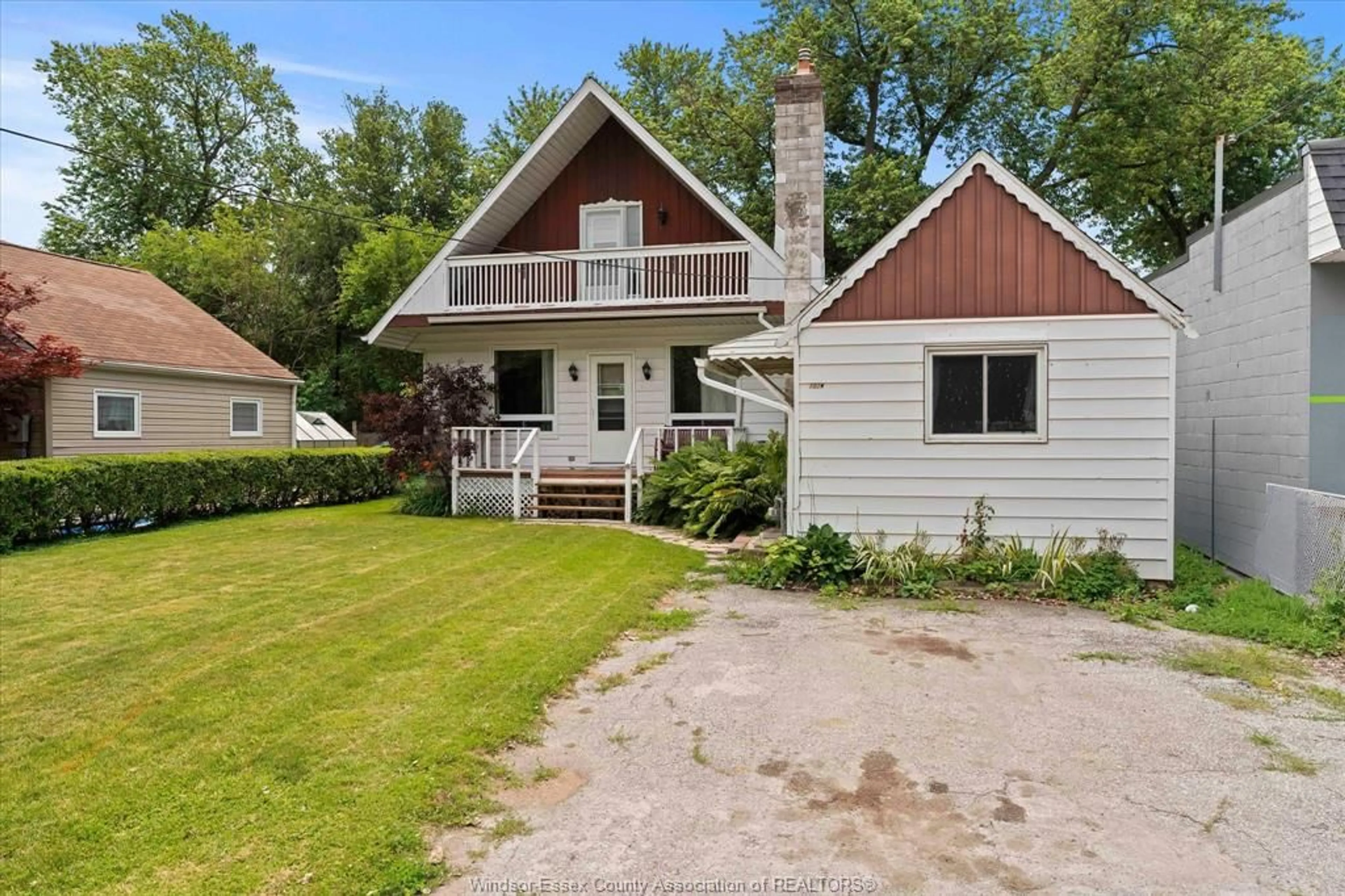 A pic from outside/outdoor area/front of a property/back of a property/a pic from drone, street for 702 Notre Dame St, Lakeshore Ontario N8L 1K8