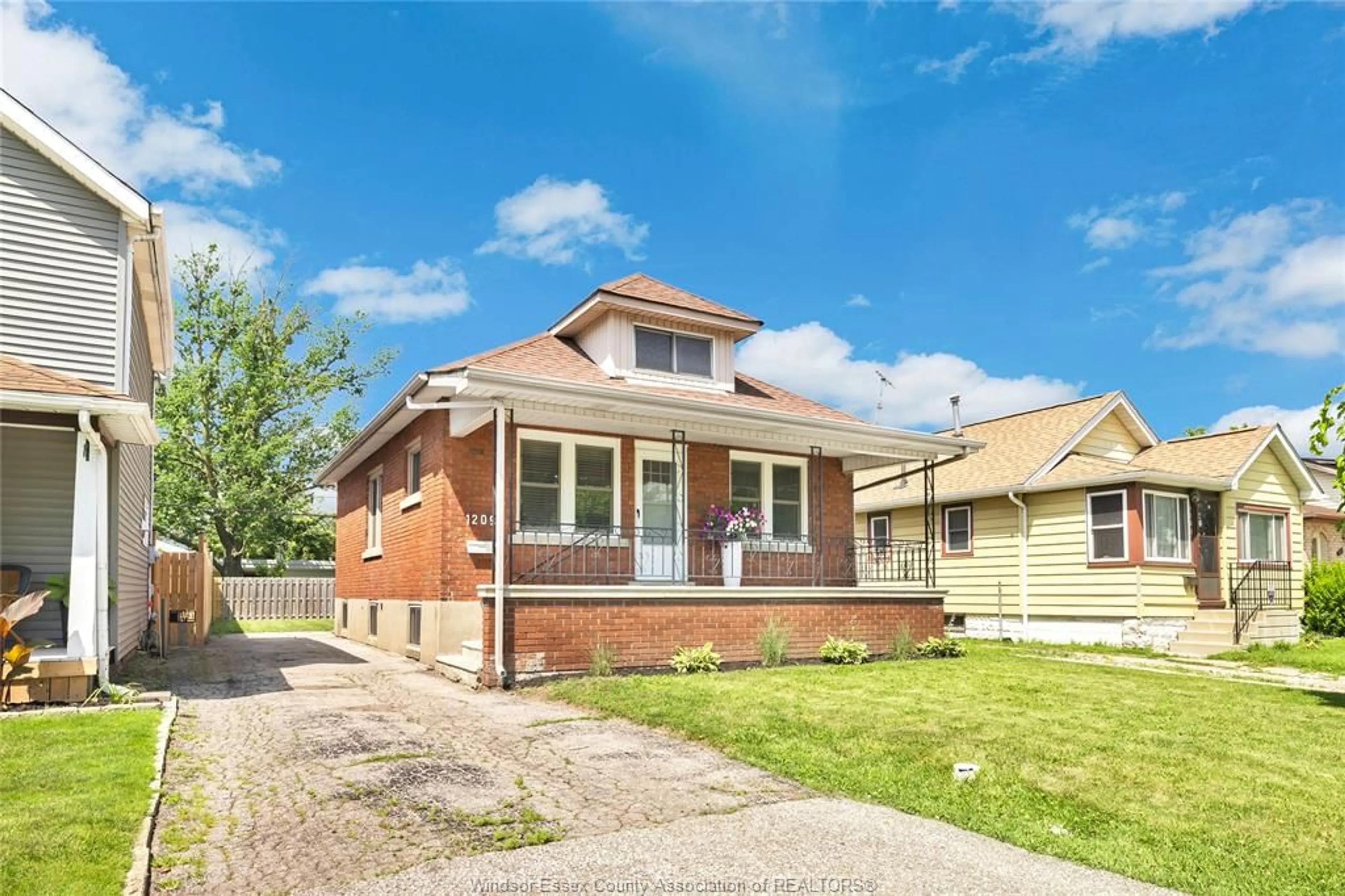 Home with brick exterior material, street for 1209 CURRY Ave, Windsor Ontario N9B 2C8