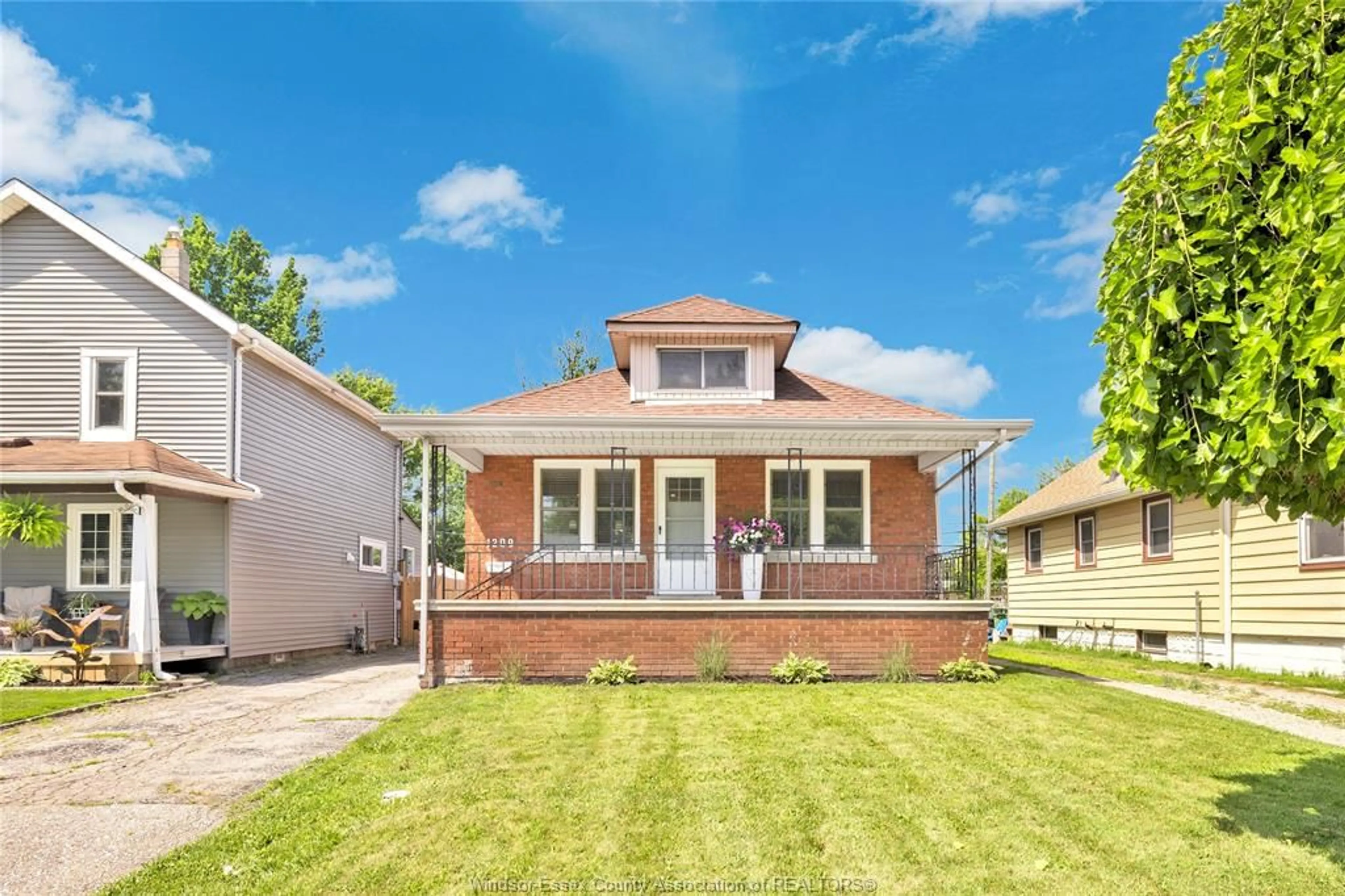 Home with brick exterior material, street for 1209 CURRY Ave, Windsor Ontario N9B 2C8