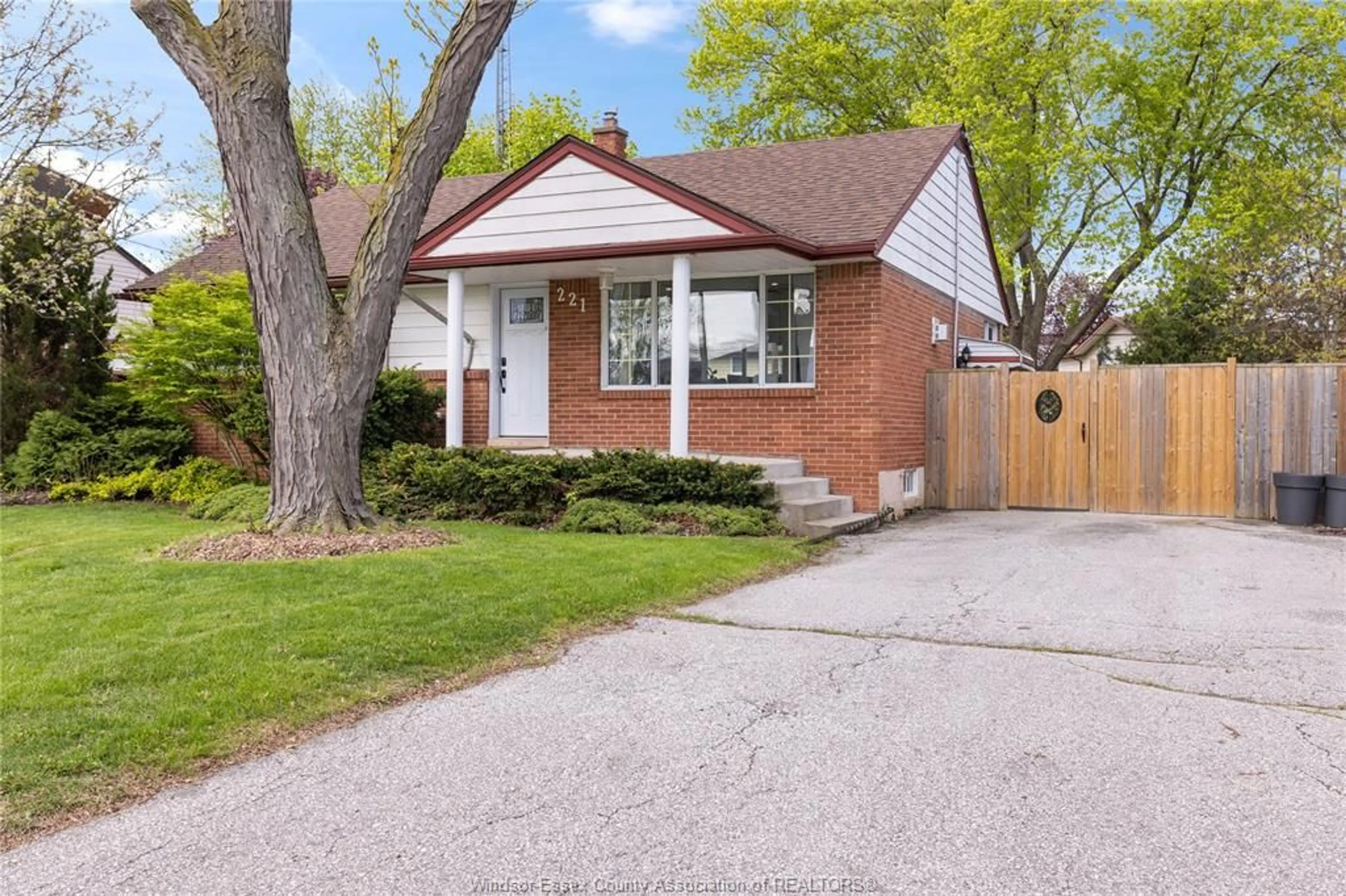 Home with brick exterior material, street for 221 GRACE Rd, Tecumseh Ontario N8N 2G6