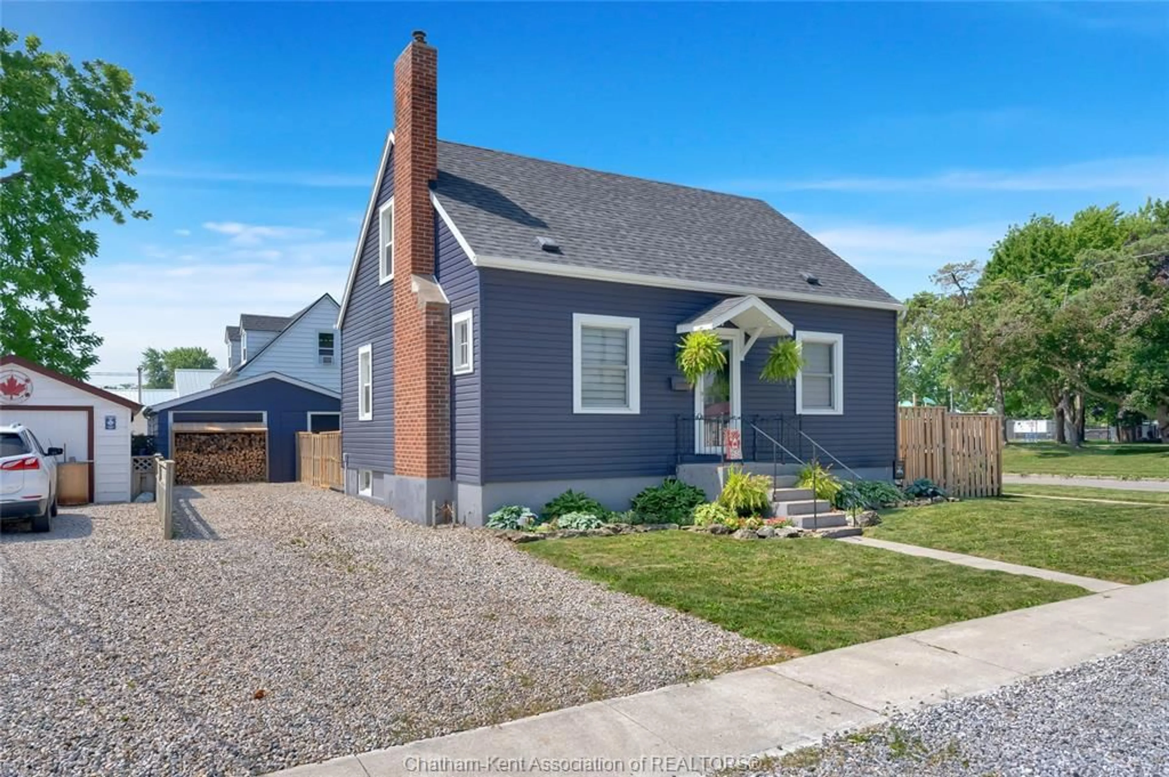 Home with brick exterior material, street for 1037 Elizabeth St, Wallaceburg Ontario N8A 3A6