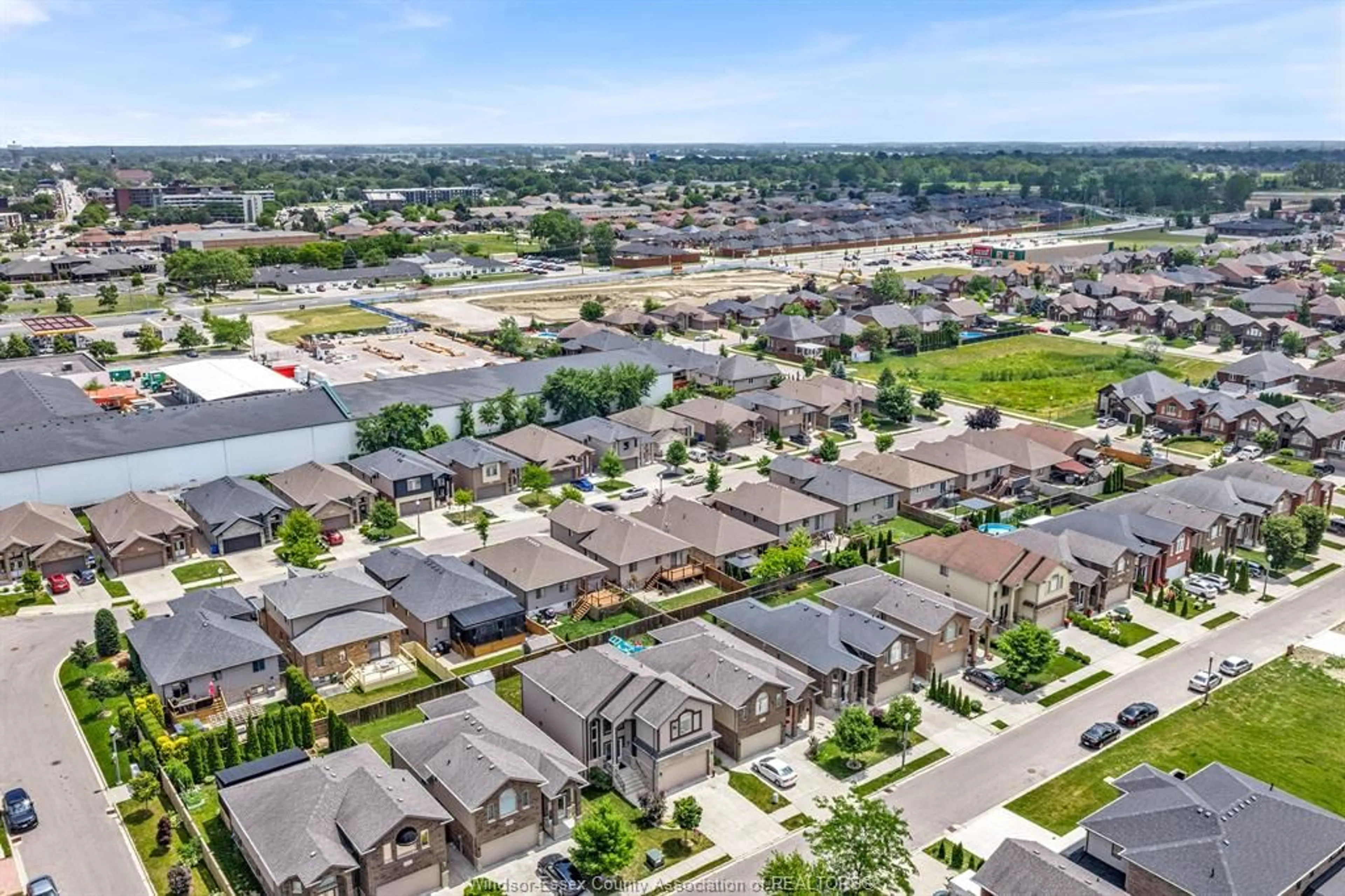 A pic from outside/outdoor area/front of a property/back of a property/a pic from drone, street for 3000 MCROBBIE Cres, Windsor Ontario N8R 0B1