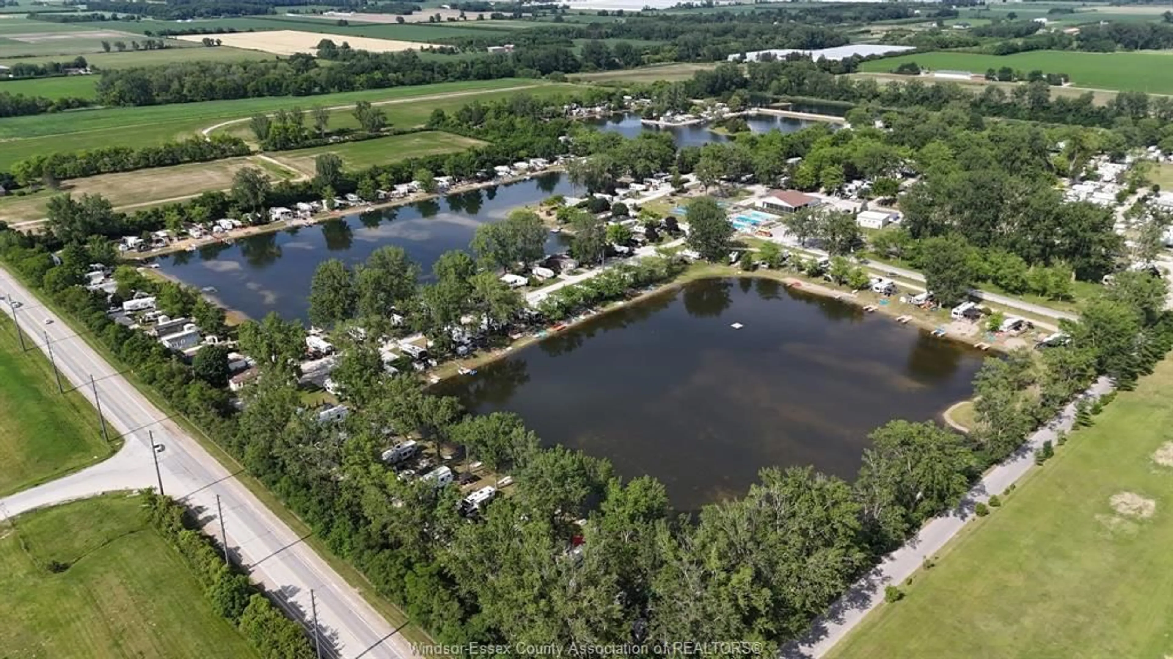 A pic from outside/outdoor area/front of a property/back of a property/a pic from drone, water/lake/river/ocean view for 29 APPLE Lane, Leamington Ontario N0P 2G0
