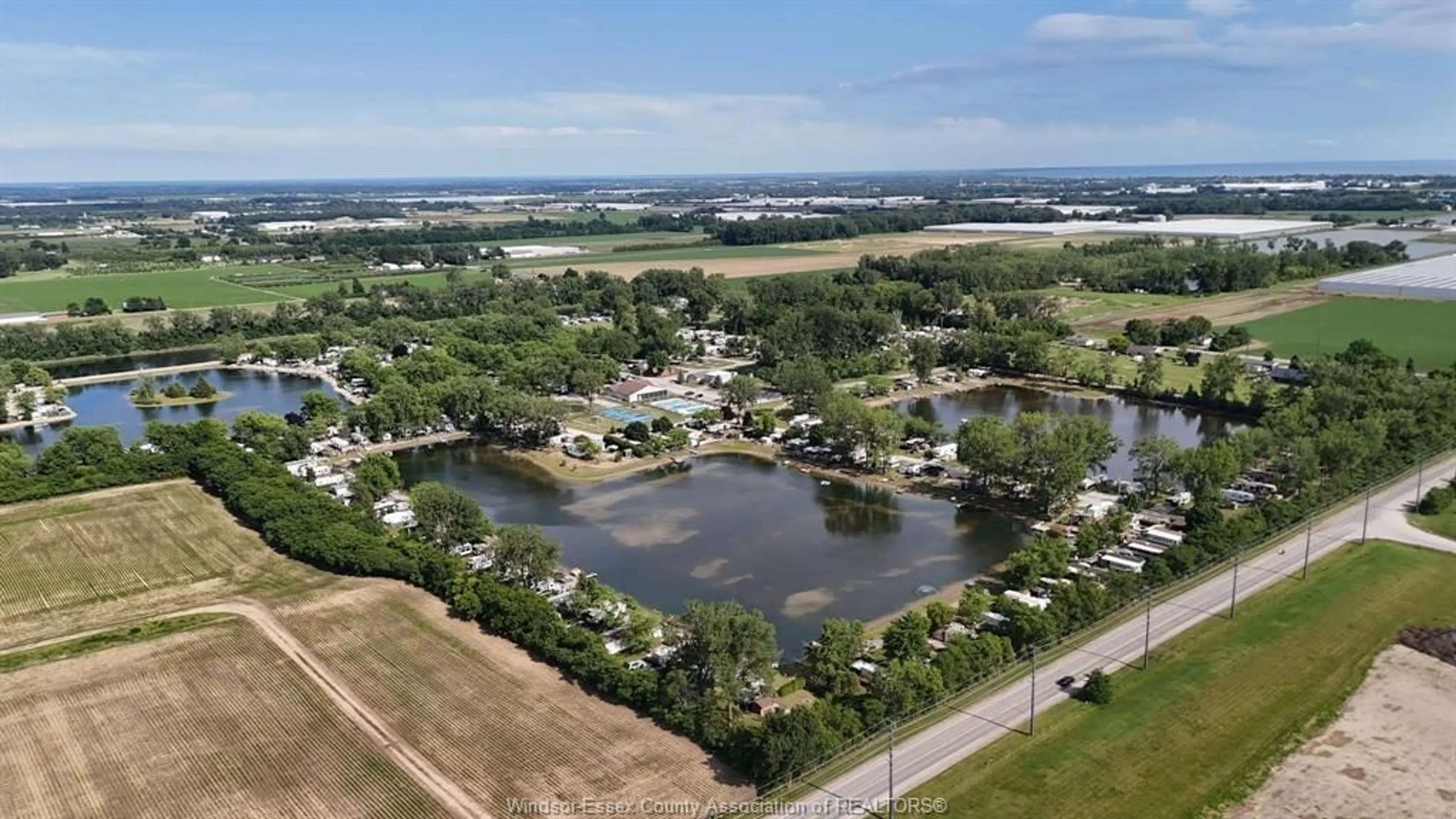 A pic from outside/outdoor area/front of a property/back of a property/a pic from drone, water/lake/river/ocean view for 29 APPLE Lane, Leamington Ontario N0P 2G0