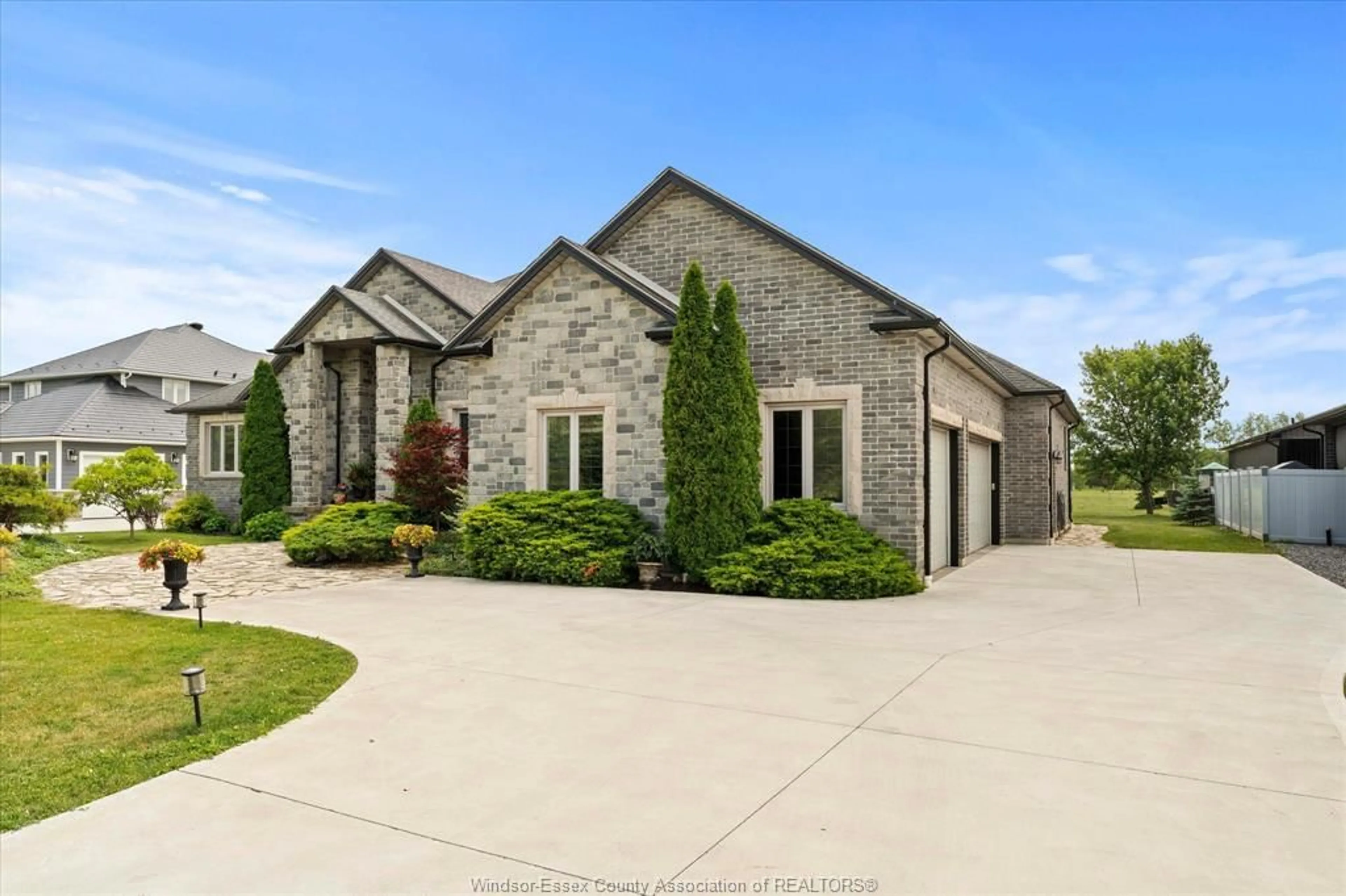 Home with brick exterior material, street for 412 COUNTY RD 2, Lakeshore Ontario N0R 1A0
