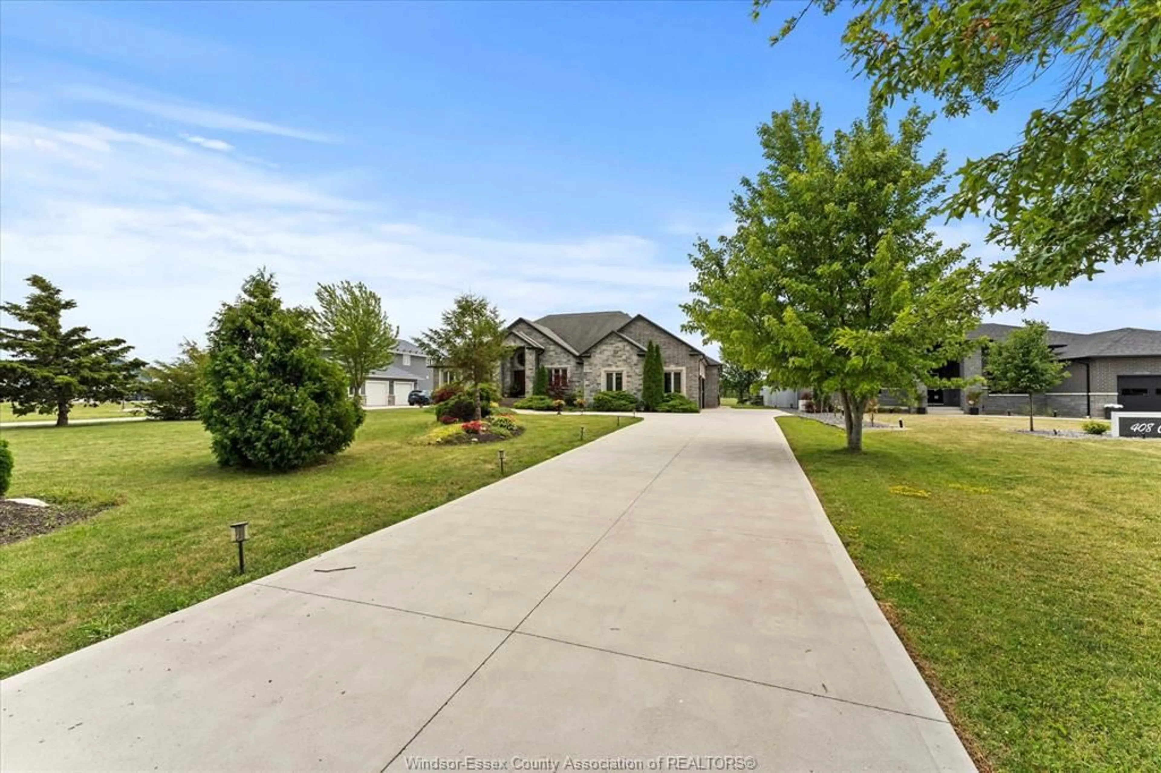 A pic from outside/outdoor area/front of a property/back of a property/a pic from drone, street for 412 COUNTY RD 2, Lakeshore Ontario N0R 1A0