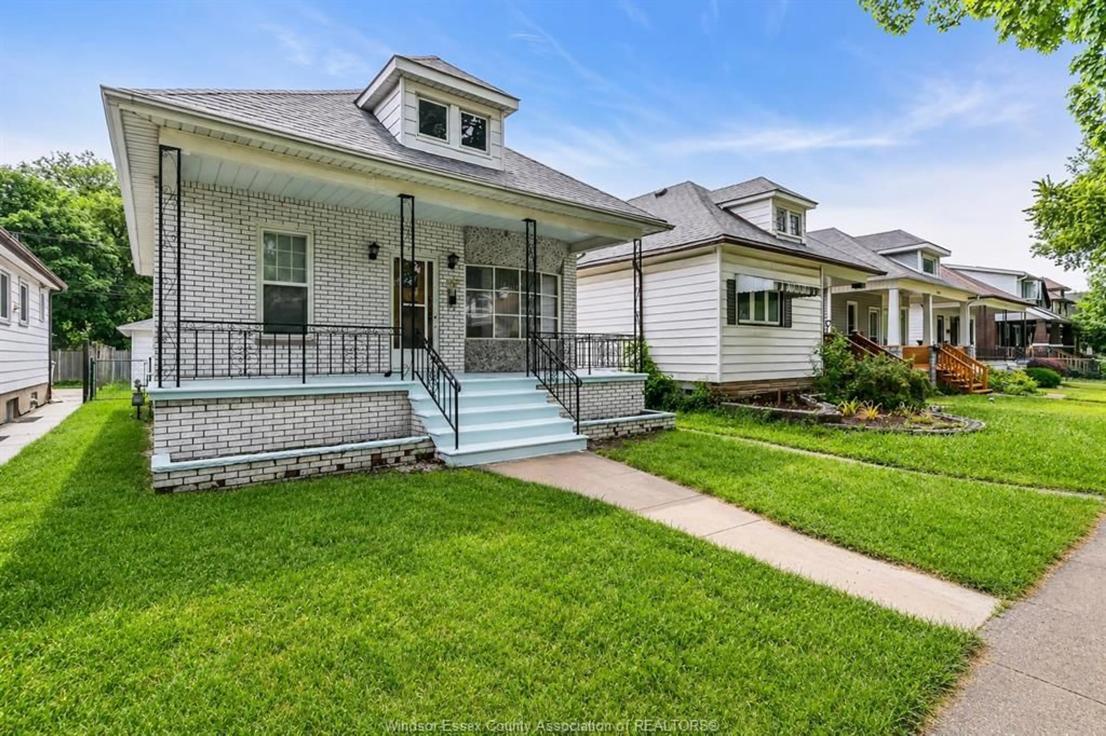 Home with brick exterior material, street for 383 MCEWAN, Windsor Ontario N9B 2E5