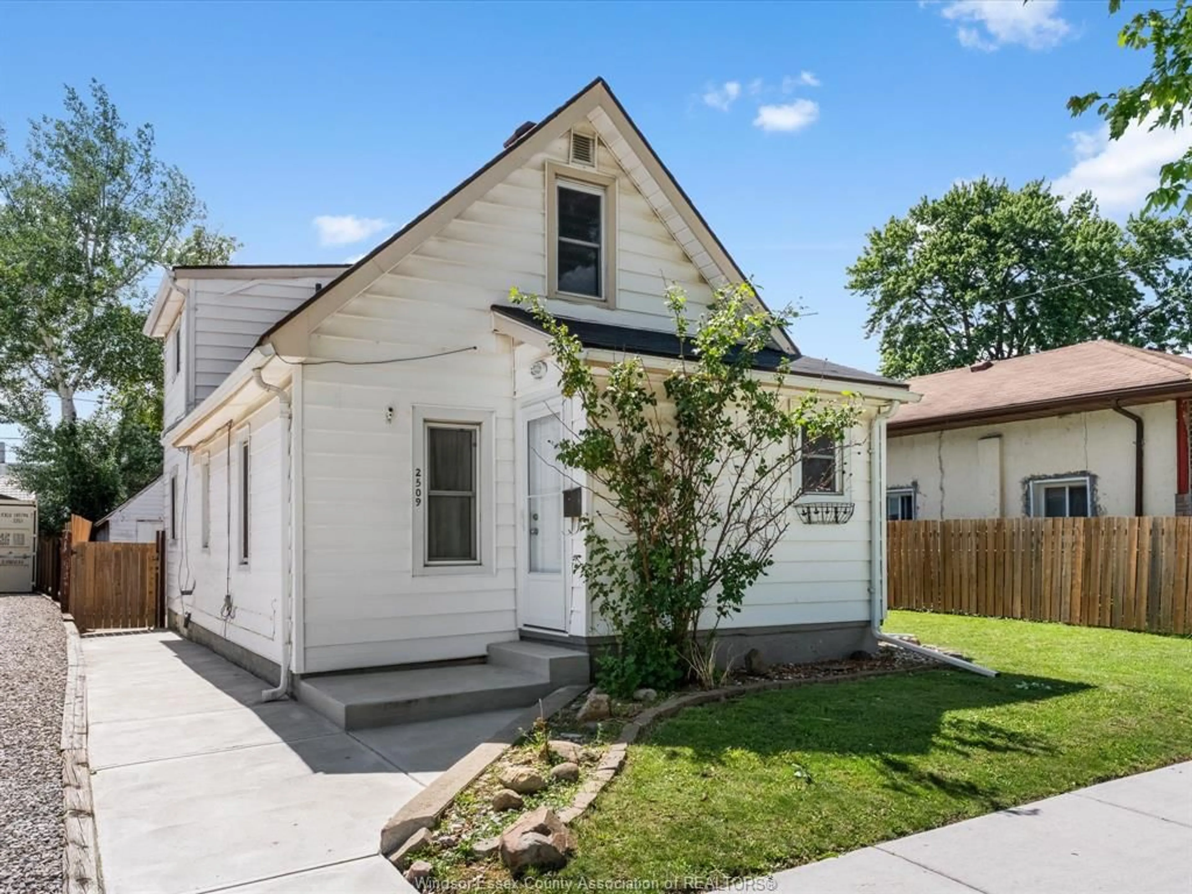 Home with vinyl exterior material, street for 2509 ALEXIS Rd, Windsor Ontario N9J 1Y3