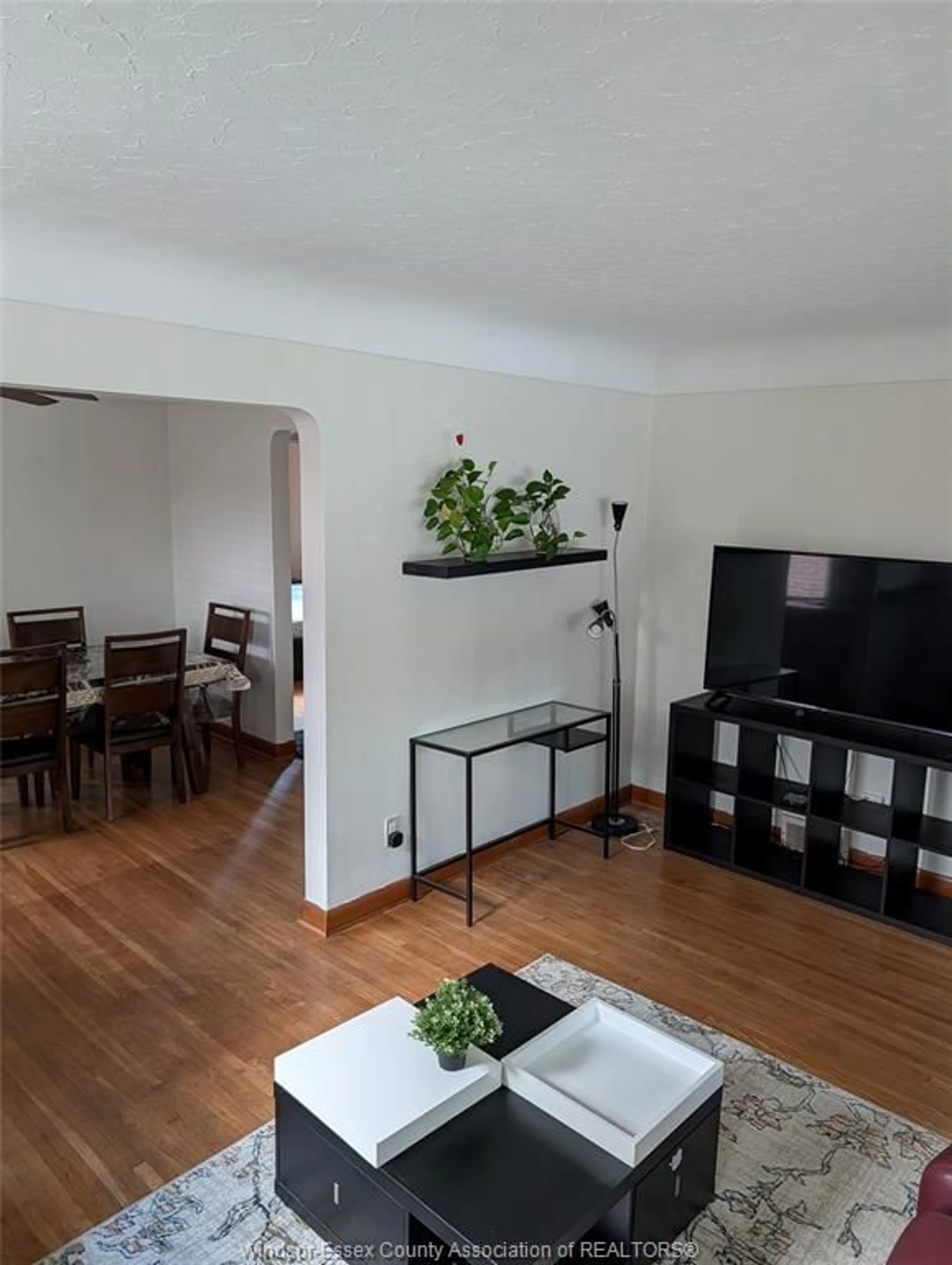 Living room with furniture, wood/laminate floor for 1868 PILLETTE, Windsor Ontario N8T 2P1