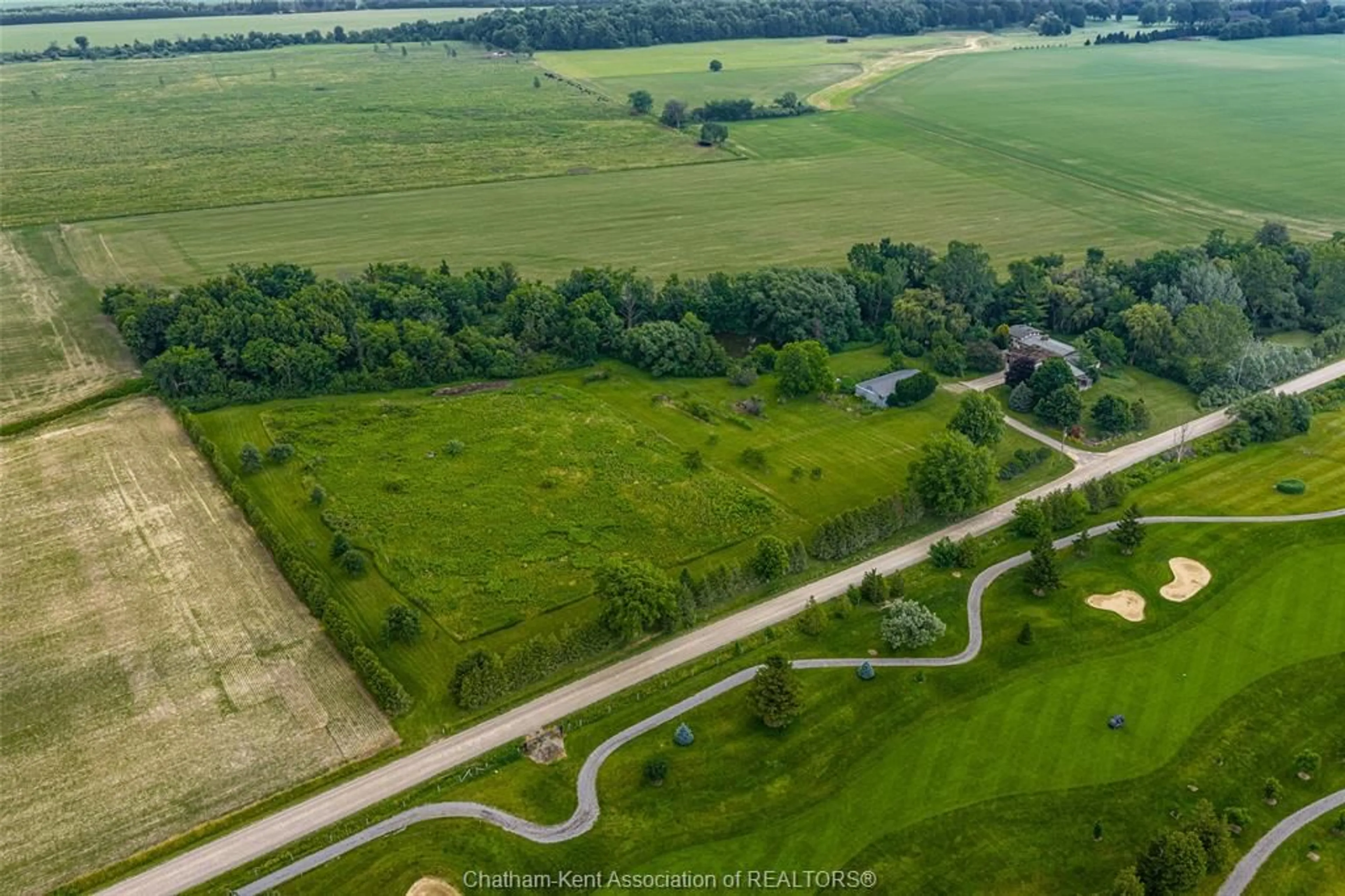 A pic from outside/outdoor area/front of a property/back of a property/a pic from drone, forest/trees view for 19429 Harwich Rd, Blenheim Ontario N0P 1A0
