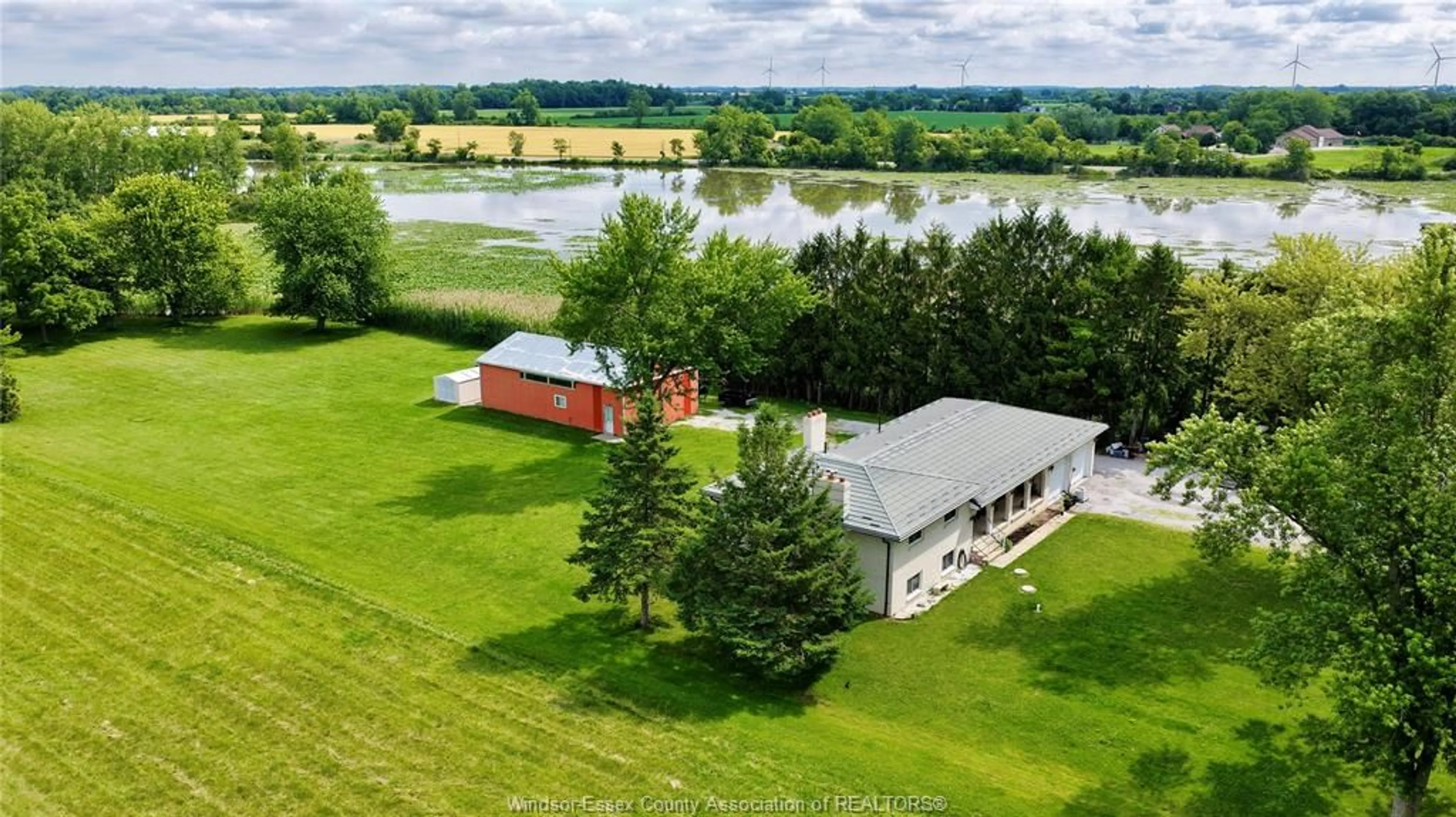 A pic from outside/outdoor area/front of a property/back of a property/a pic from drone, water/lake/river/ocean view for 3371 COUNTY ROAD 20, Amherstburg Ontario N9V 2Y8