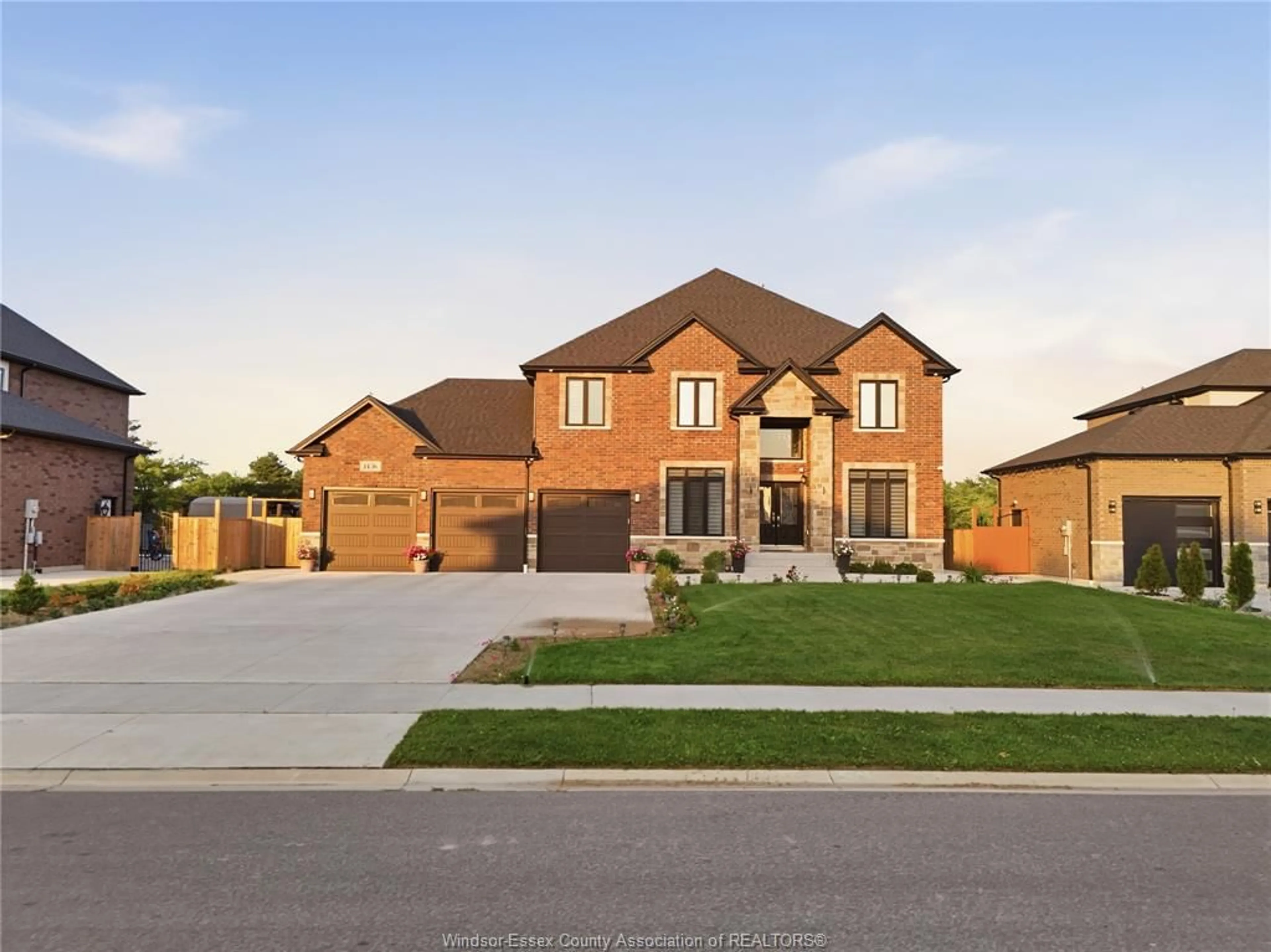 Home with brick exterior material, street for 1436 MULLINS Dr, Lakeshore Ontario N0R 1V0