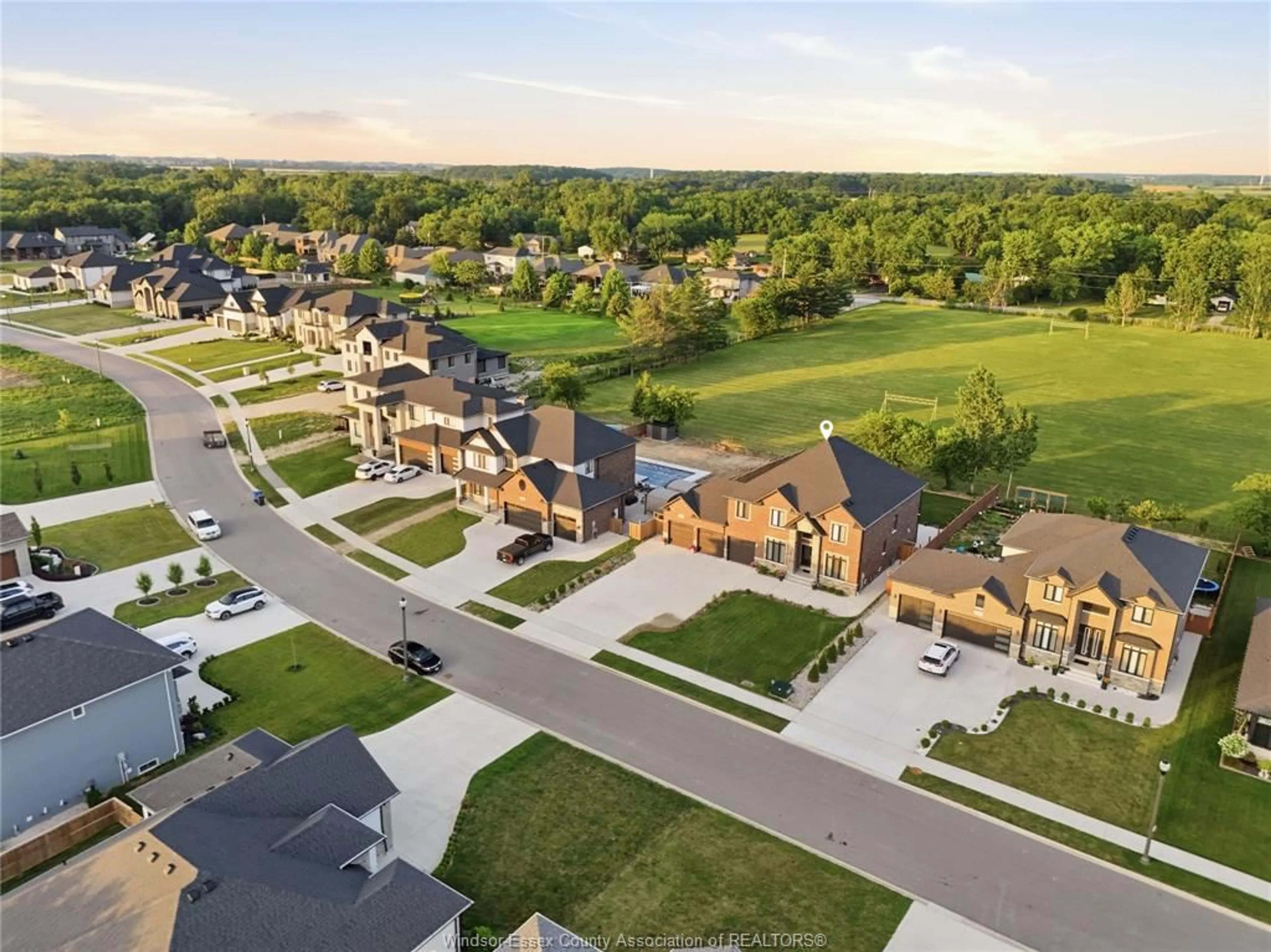 A pic from outside/outdoor area/front of a property/back of a property/a pic from drone, street for 1436 MULLINS Dr, Lakeshore Ontario N0R 1V0