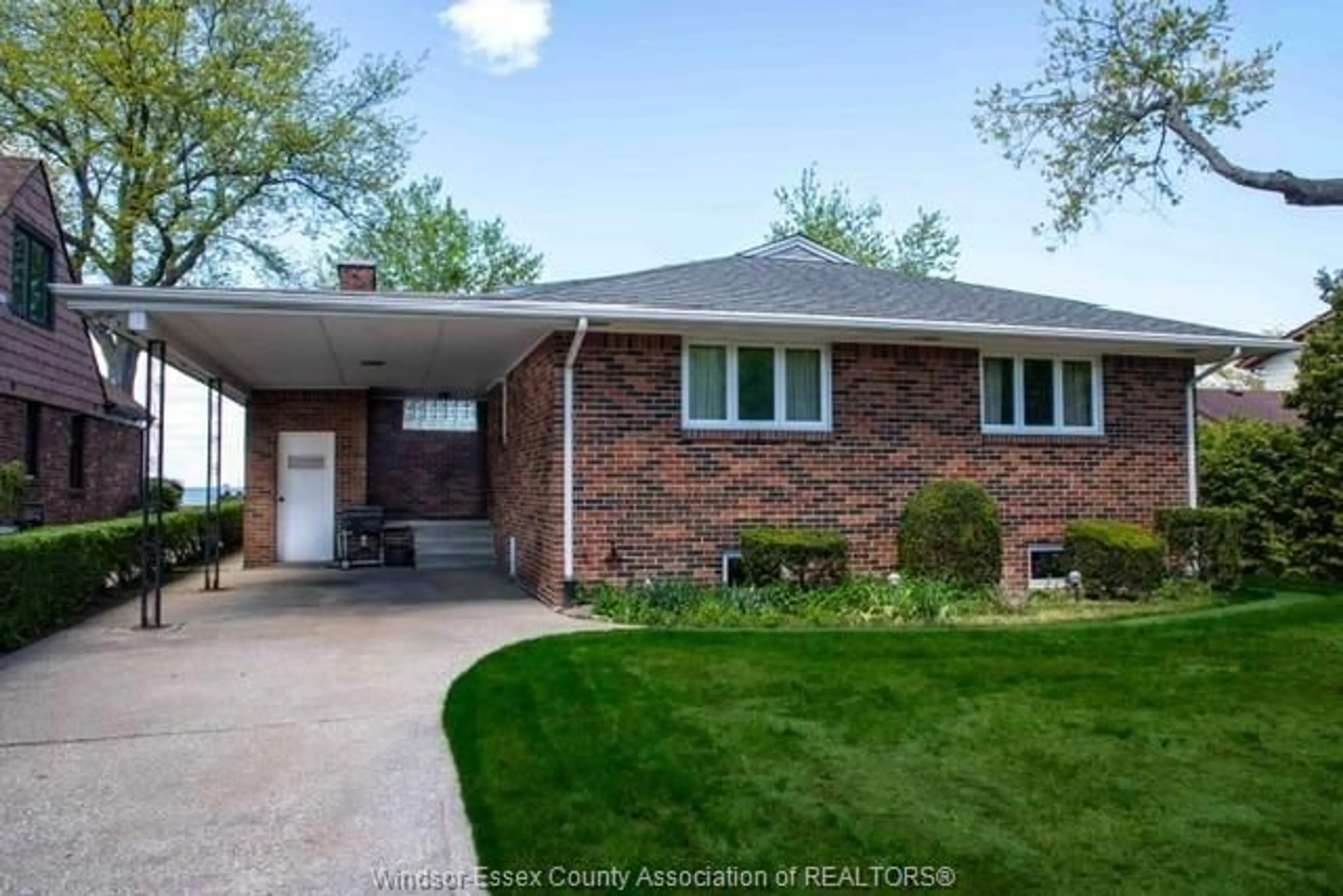 Home with brick exterior material, street for 13942 RIVERSIDE Dr, Tecumseh Ontario N8N 1B6