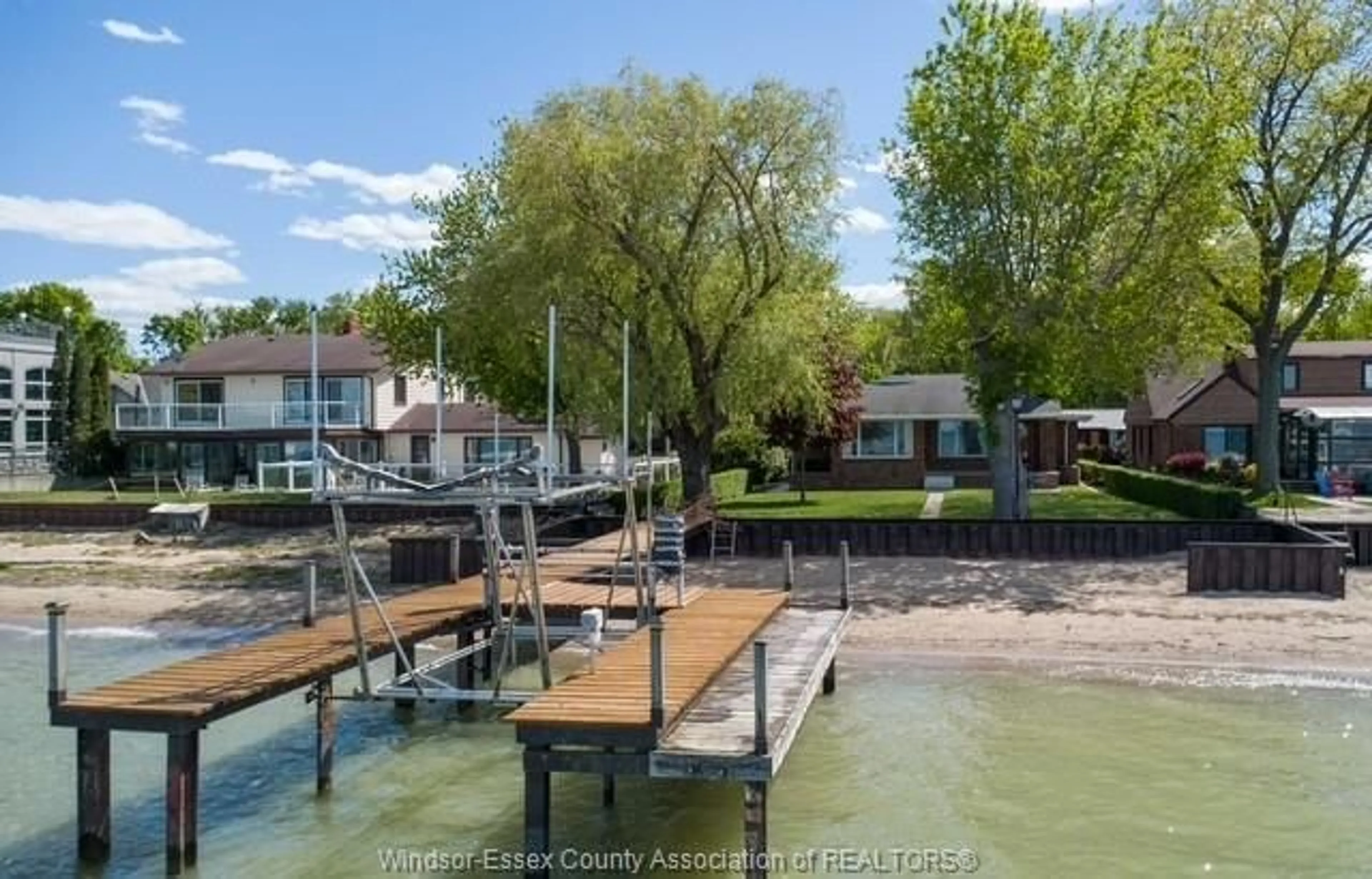 A pic from outside/outdoor area/front of a property/back of a property/a pic from drone, water/lake/river/ocean view for 13942 RIVERSIDE Dr, Tecumseh Ontario N8N 1B6