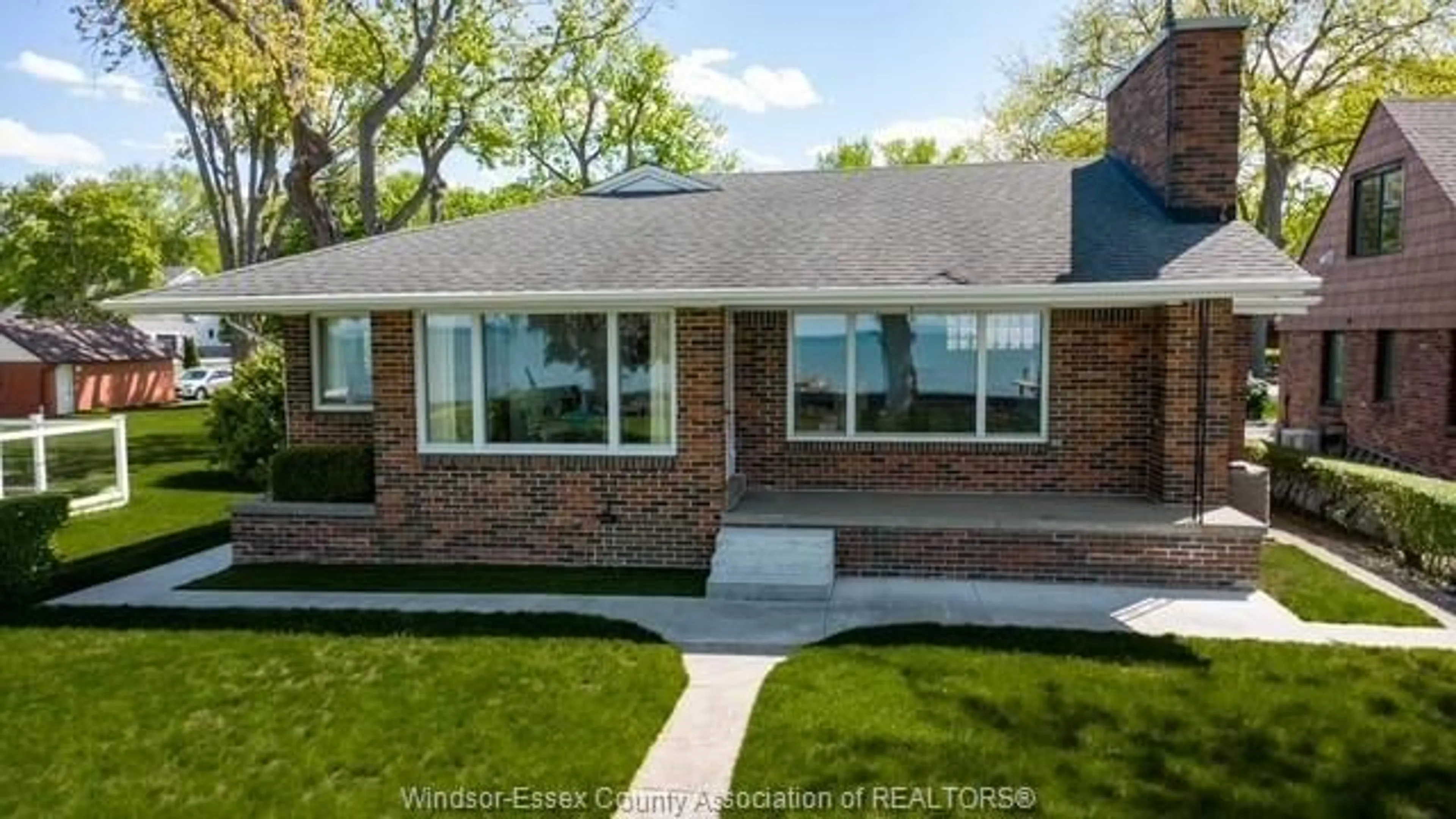 Home with brick exterior material, street for 13942 RIVERSIDE Dr, Tecumseh Ontario N8N 1B6