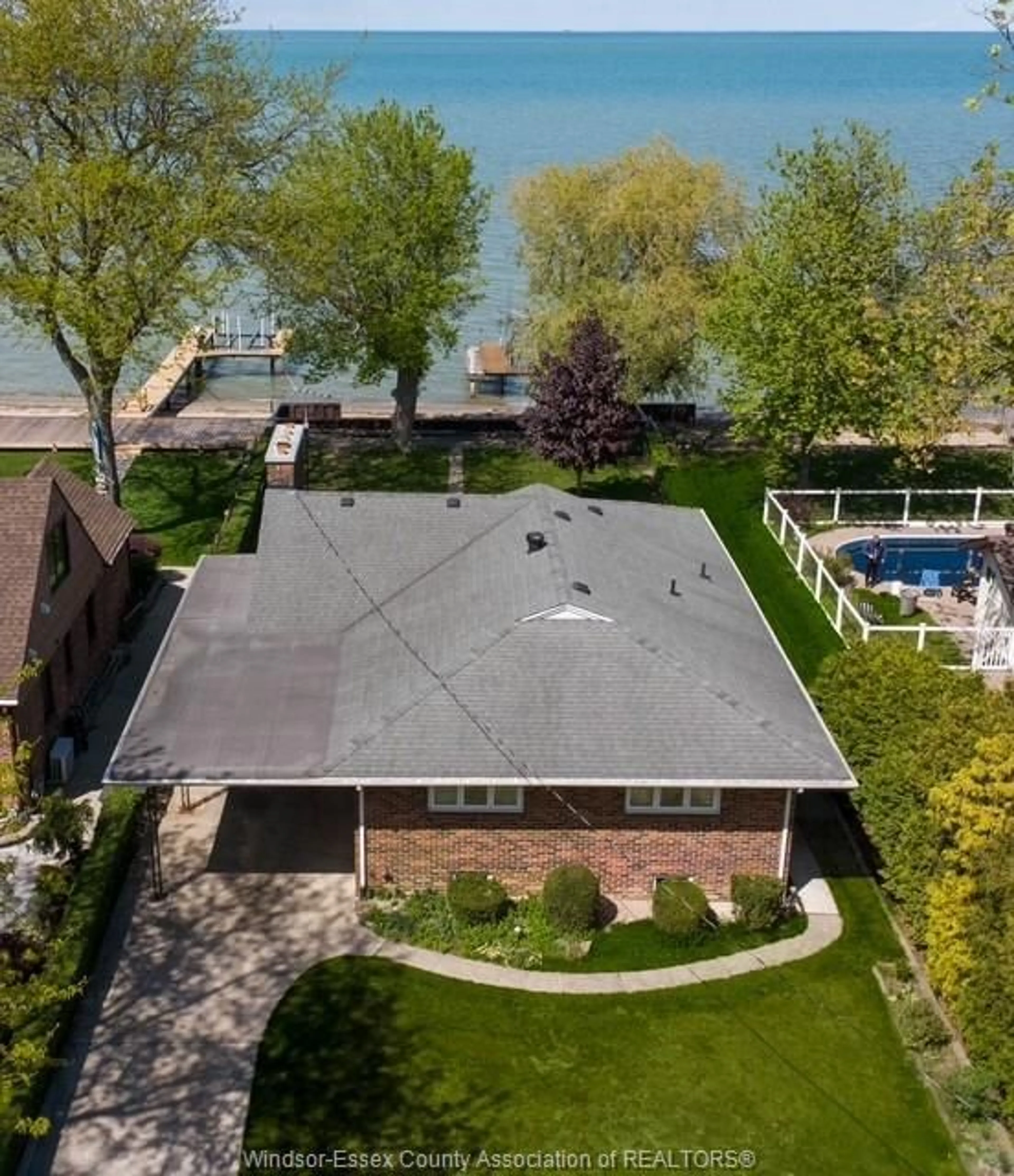 A pic from outside/outdoor area/front of a property/back of a property/a pic from drone, water/lake/river/ocean view for 13942 RIVERSIDE Dr, Tecumseh Ontario N8N 1B6