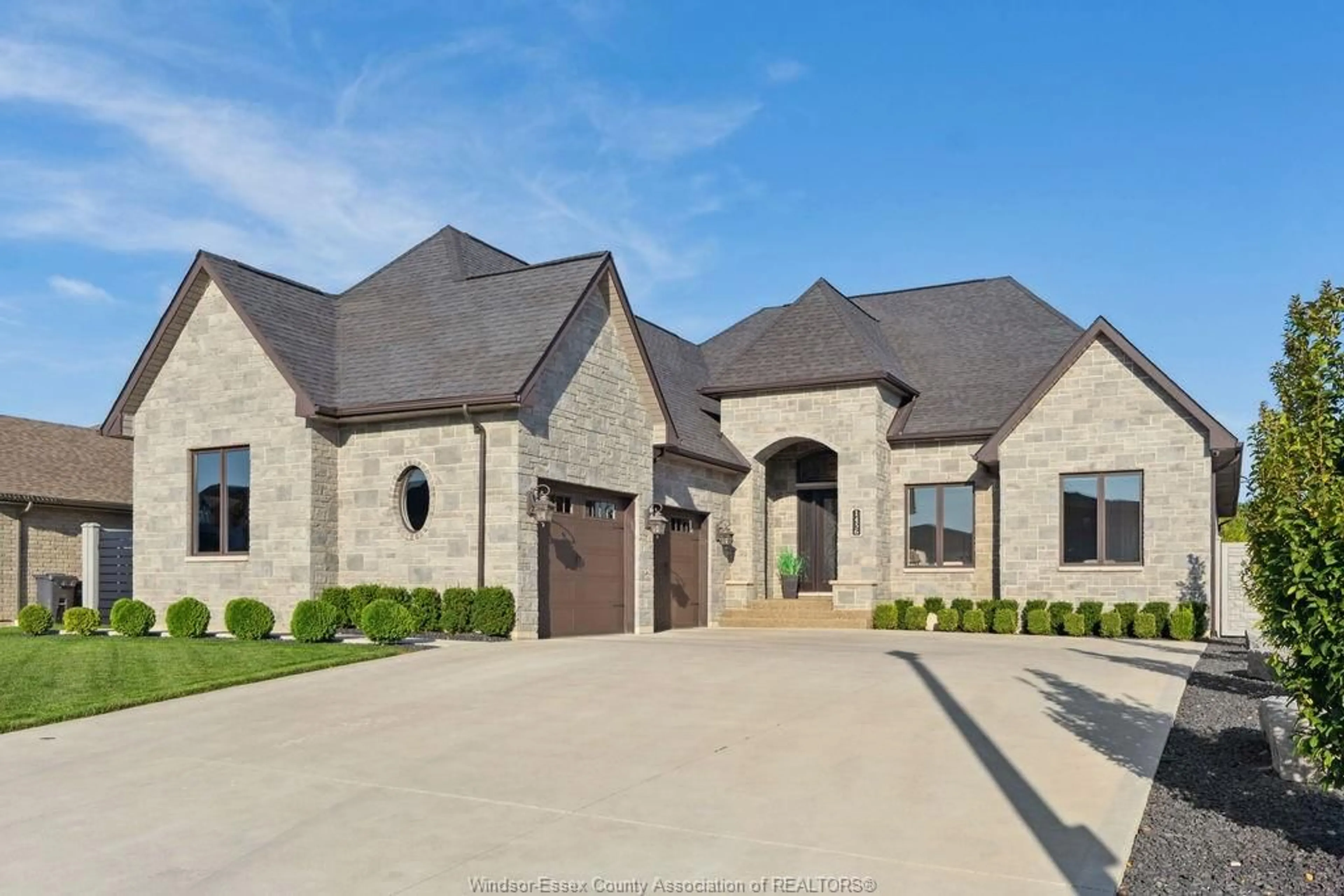 Home with brick exterior material, street for 1456 MULLINS Dr, Lakeshore Ontario N0R 1V0