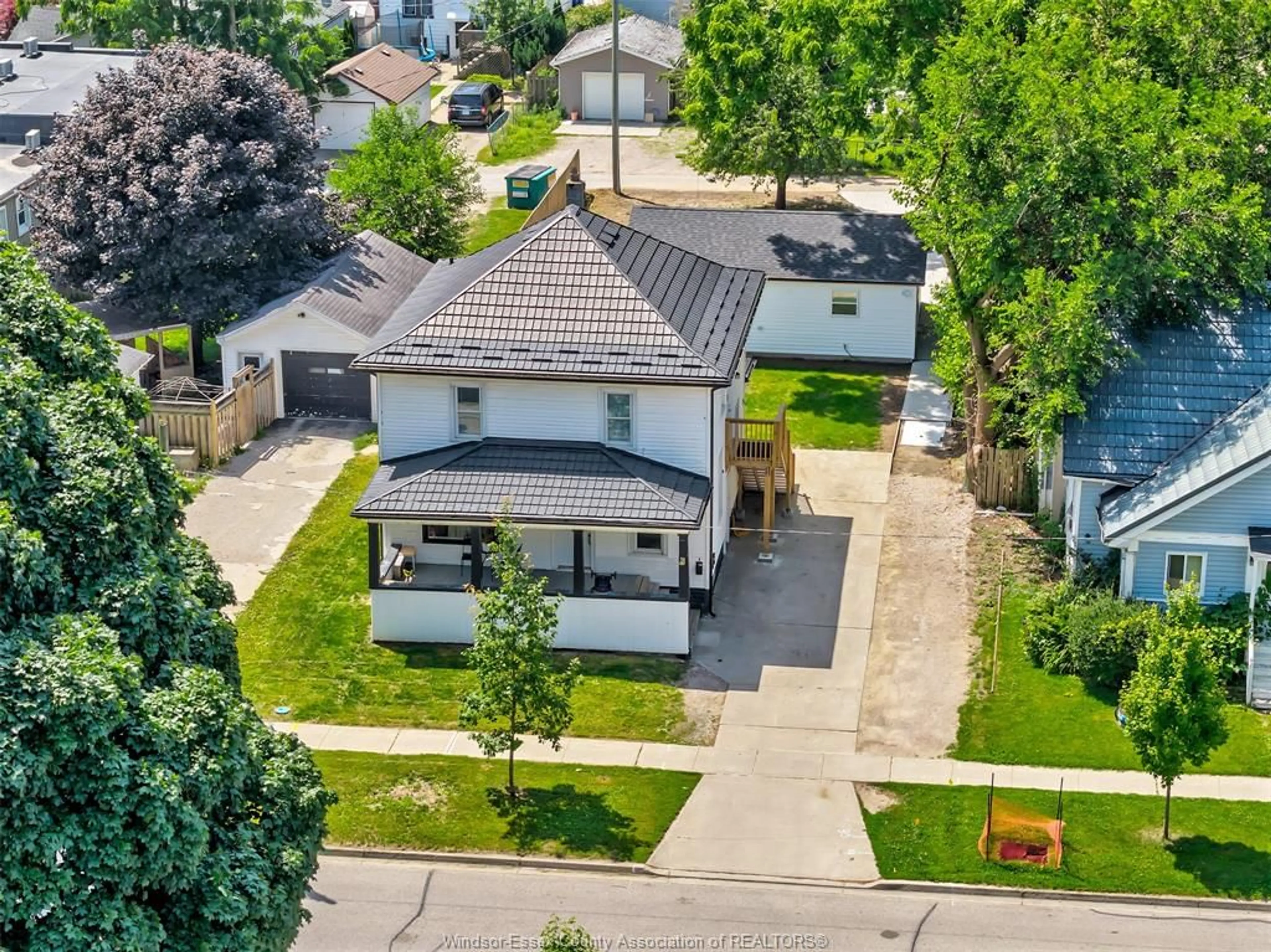 A pic from outside/outdoor area/front of a property/back of a property/a pic from drone, street for 58 MARLBOROUGH St, Leamington Ontario N8H 1W7