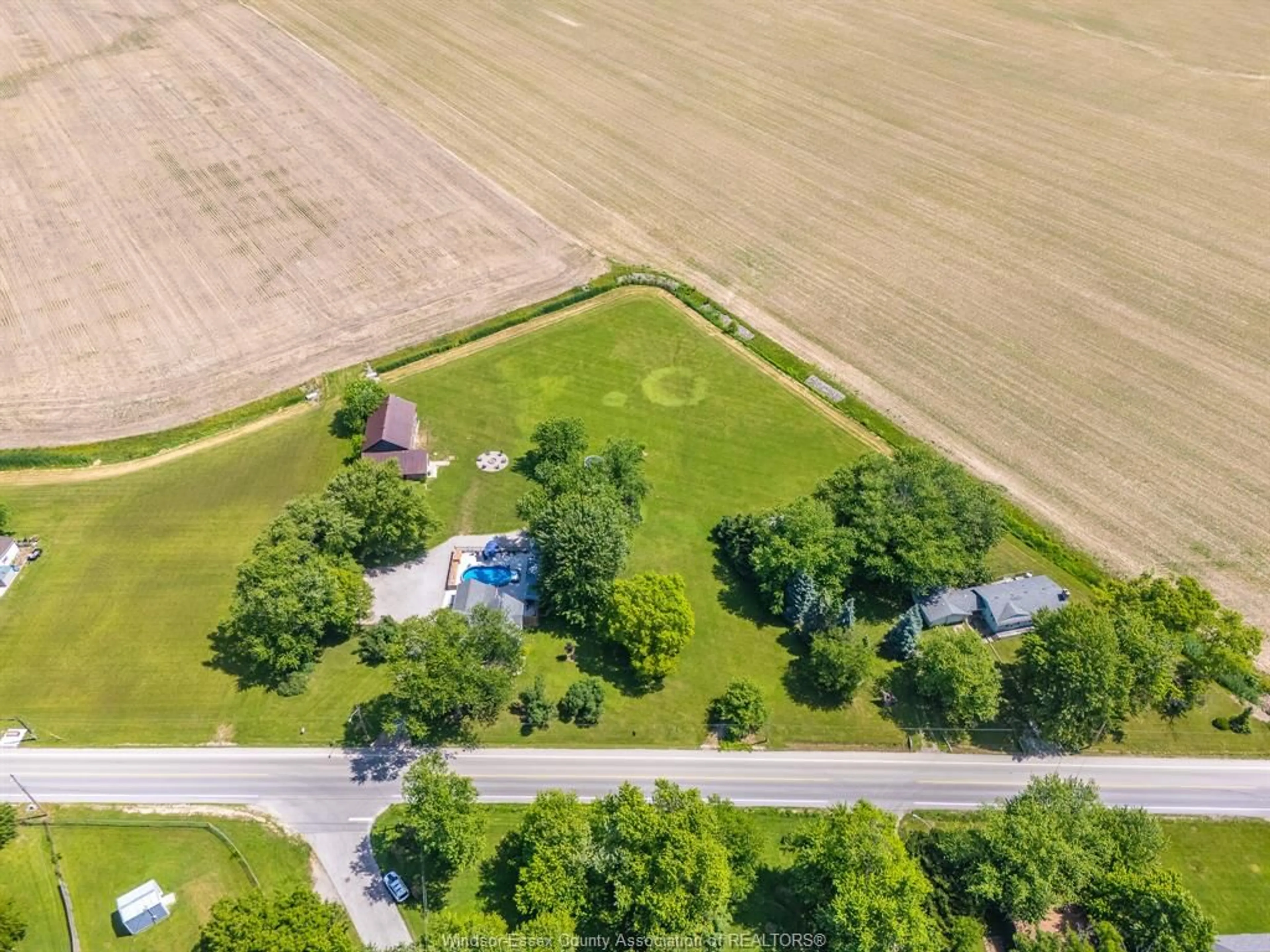 A pic from outside/outdoor area/front of a property/back of a property/a pic from drone, unknown for 668 County Rd 50, Harrow Ontario N0R 1G0