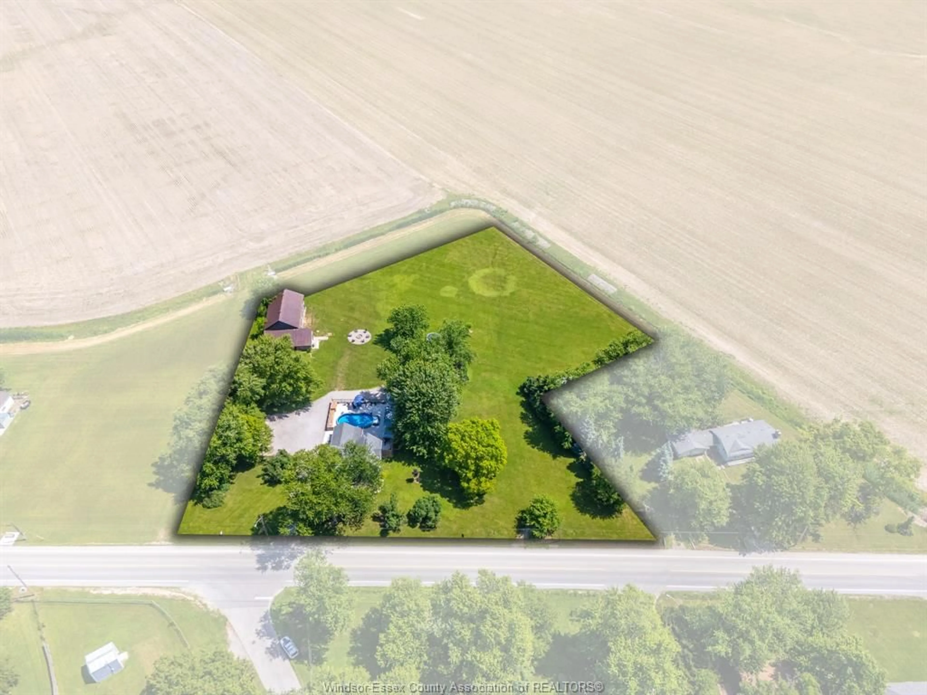 A pic from outside/outdoor area/front of a property/back of a property/a pic from drone, water/lake/river/ocean view for 668 County Rd 50, Harrow Ontario N0R 1G0