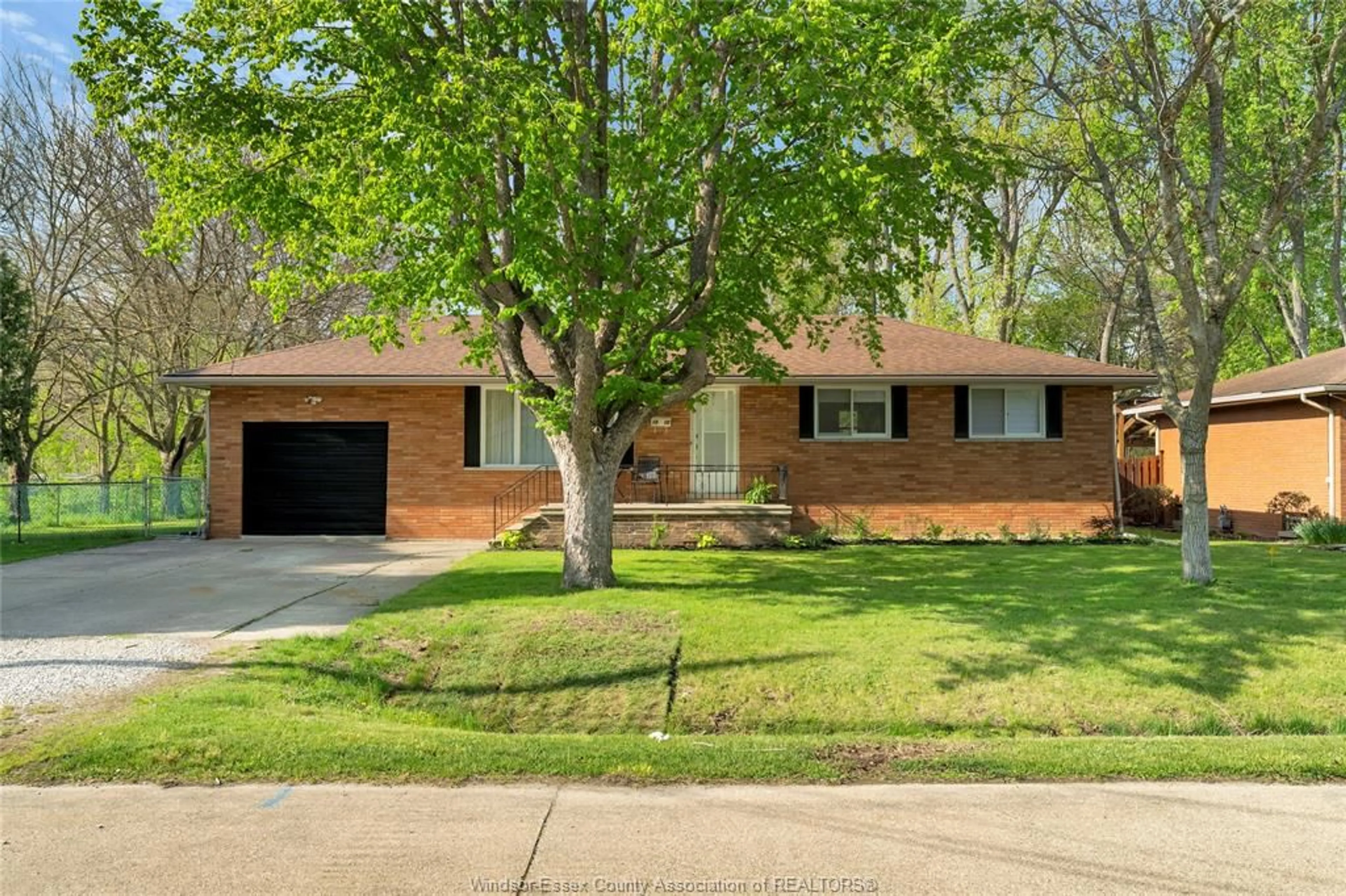 Home with brick exterior material, street for 1910 KENT St, Windsor Ontario N9E 3R3