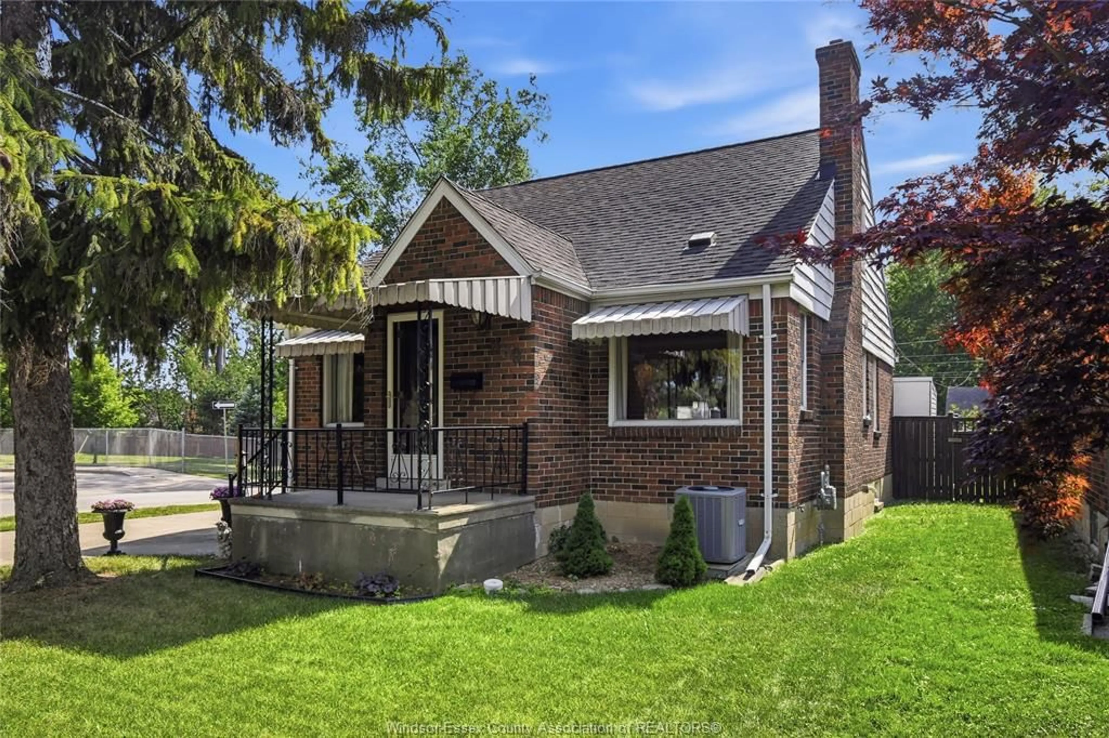 Home with brick exterior material, street for 889 PATRICE Dr, Windsor Ontario N8S 2R7