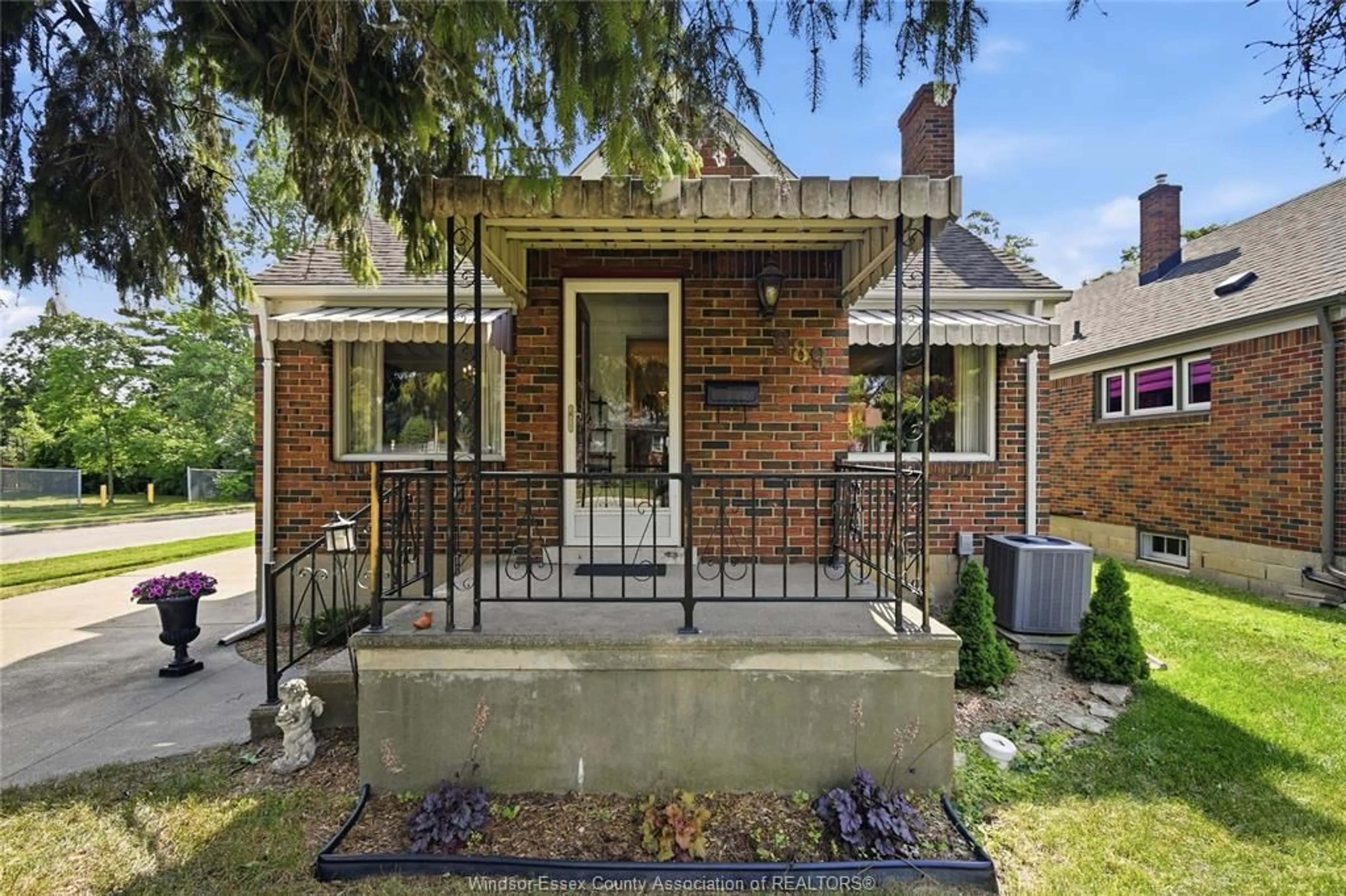 Home with brick exterior material, street for 889 PATRICE Dr, Windsor Ontario N8S 2R7