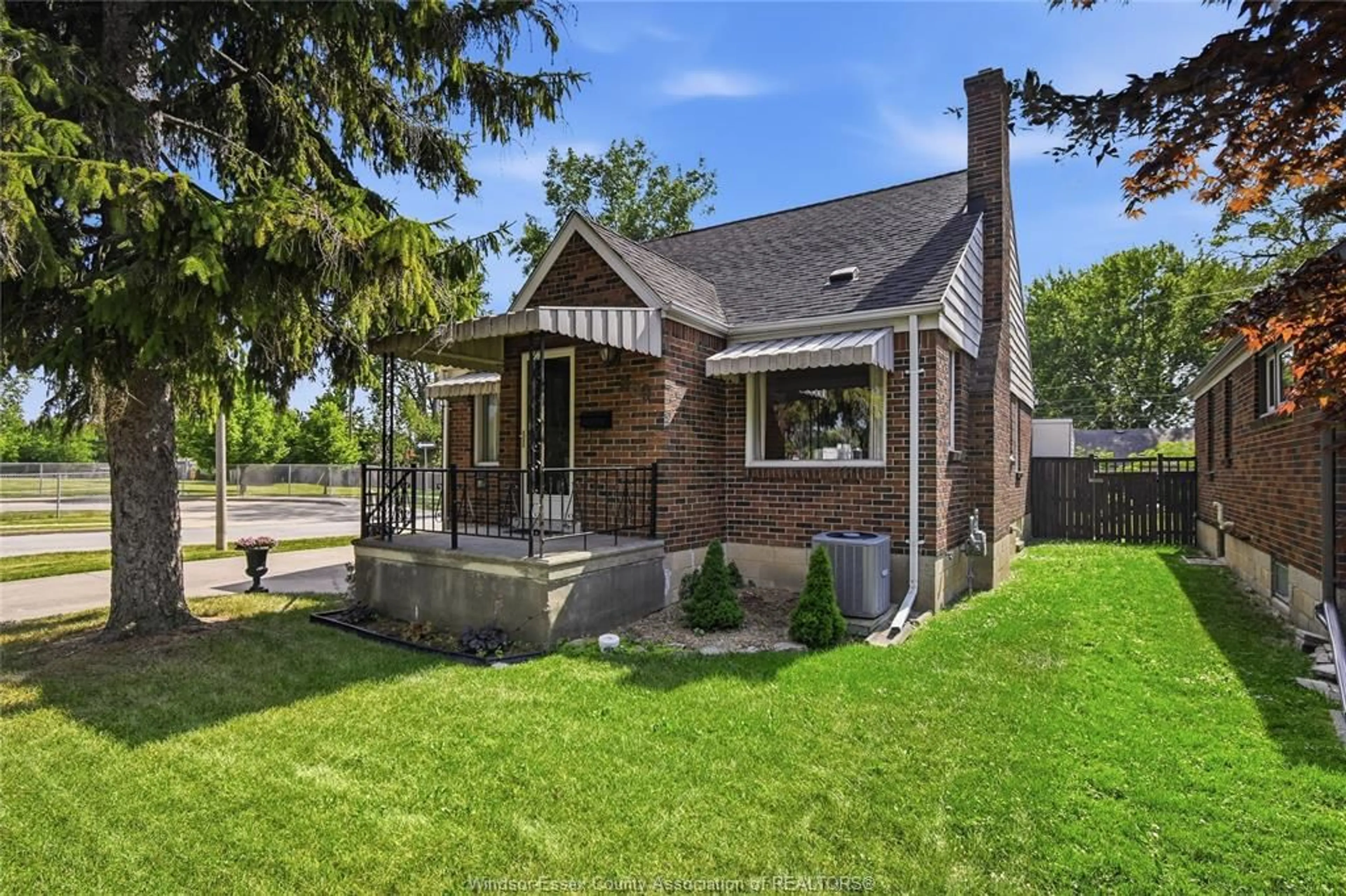 Home with brick exterior material, street for 889 PATRICE Dr, Windsor Ontario N8S 2R7