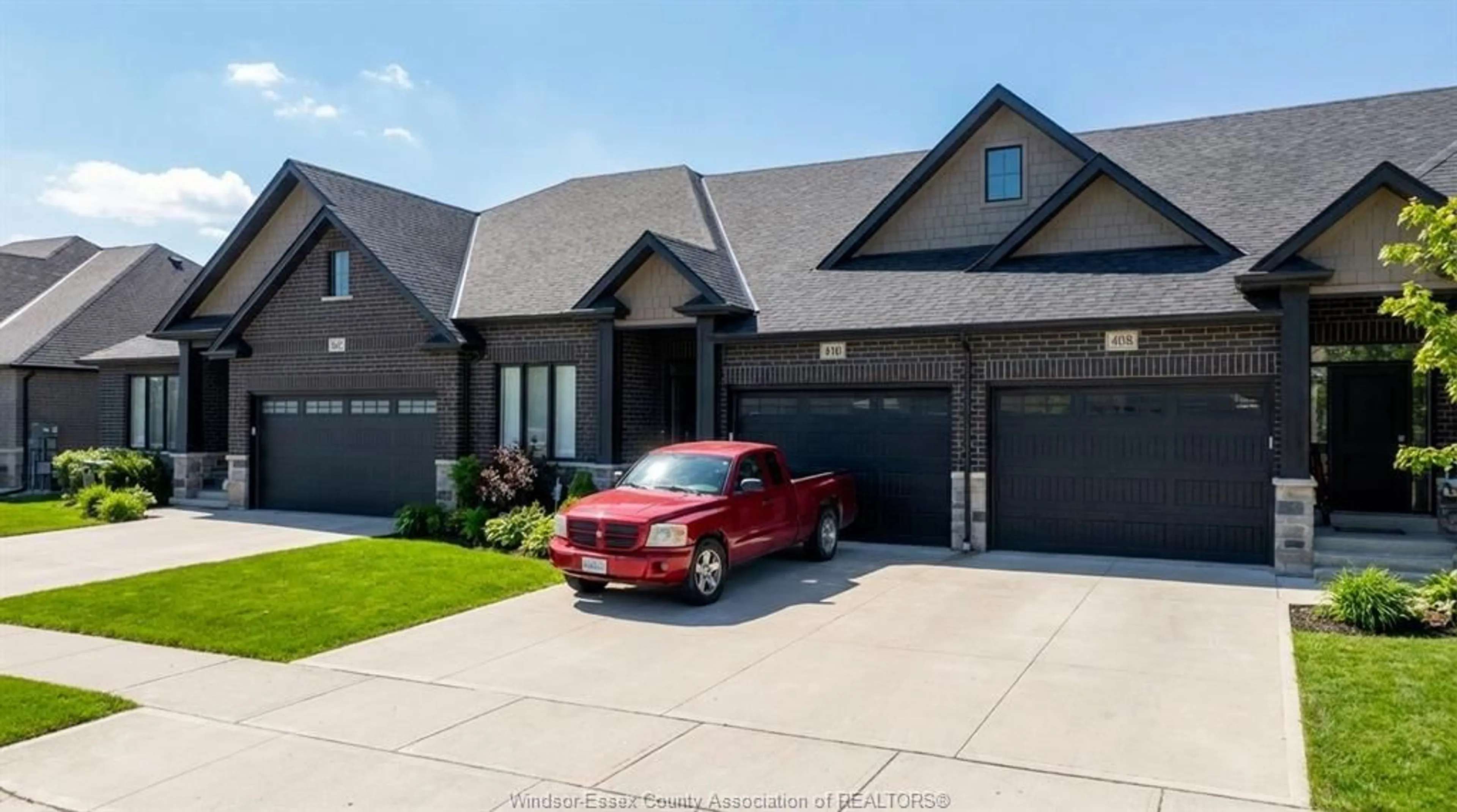 Home with brick exterior material, street for 410 CASERTA Cres, Lakeshore Ontario N0R 1Z0