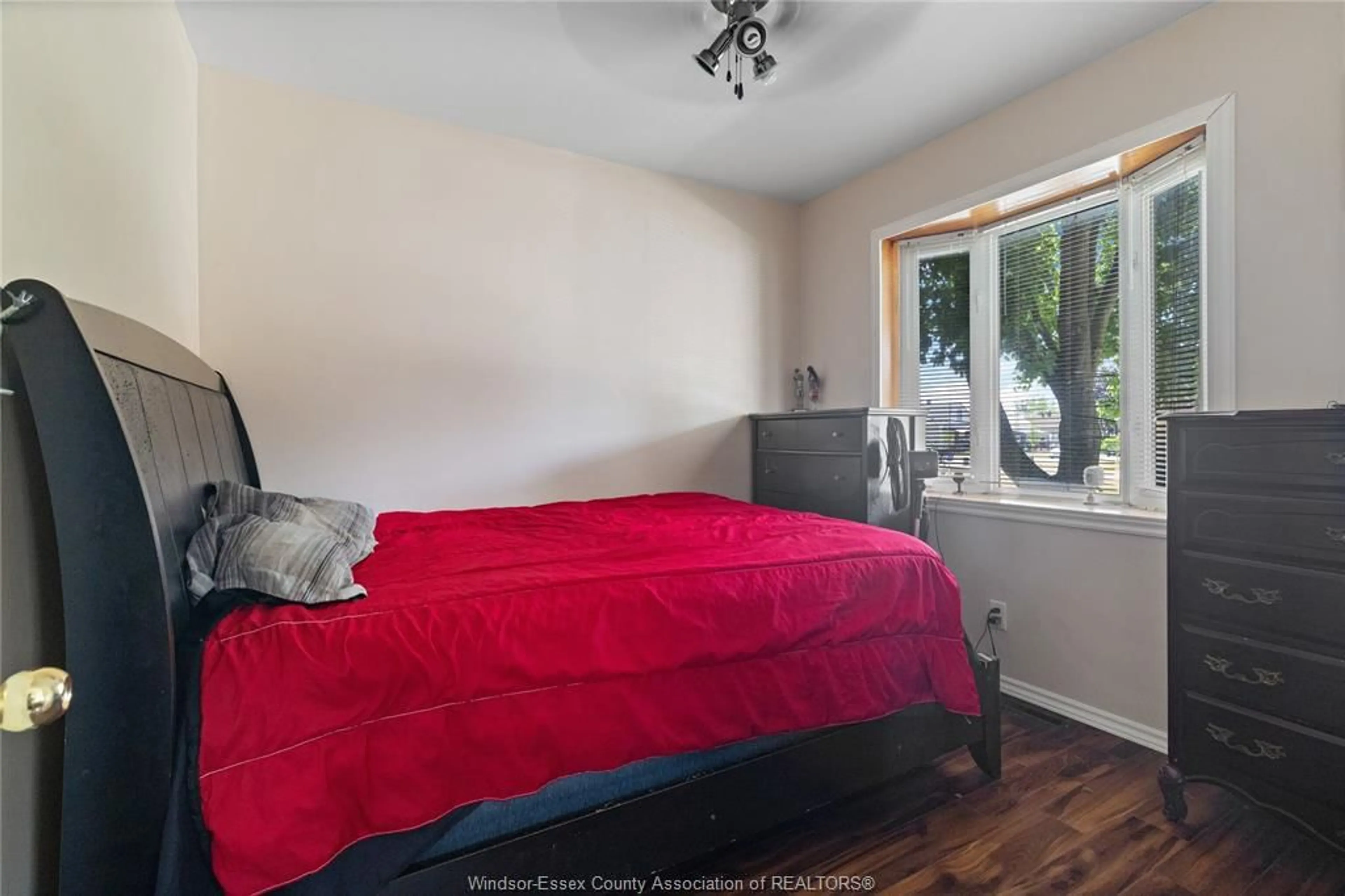 Bedroom with bed, wood/laminate floor for 2382 Mercer St, Windsor Ontario N8X 3R3