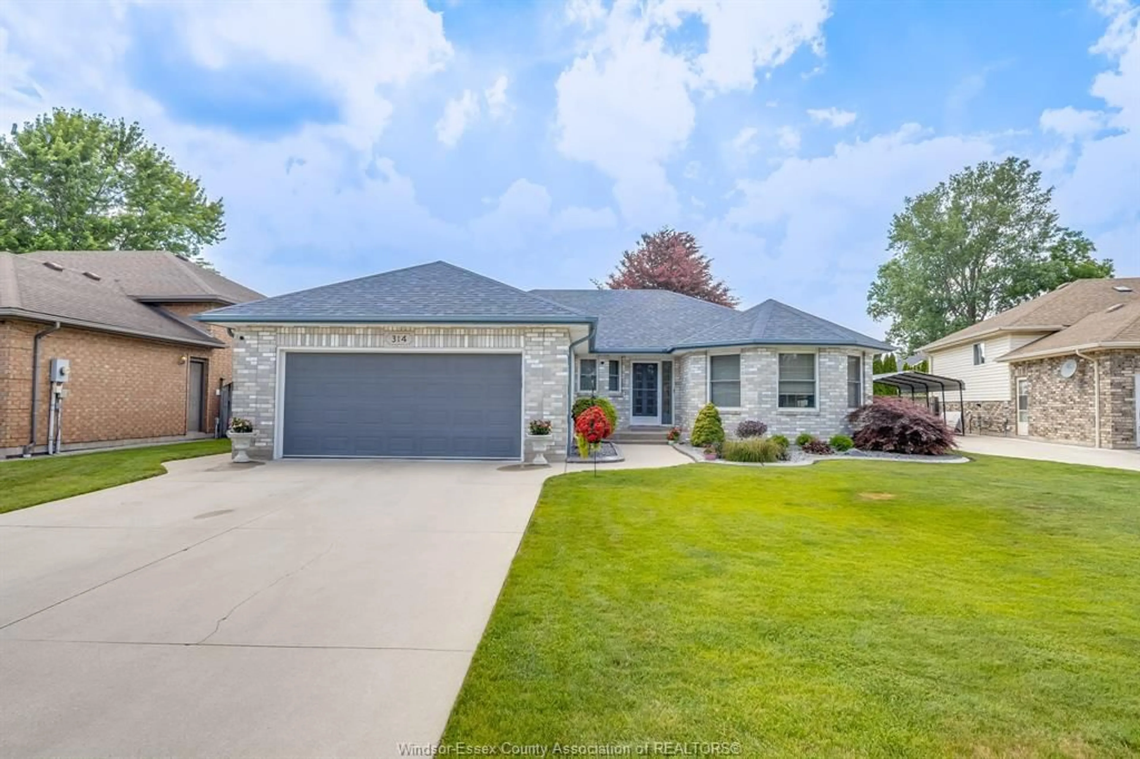 Home with vinyl exterior material, street for 314 MENARD, LaSalle Ontario N9J 1C4