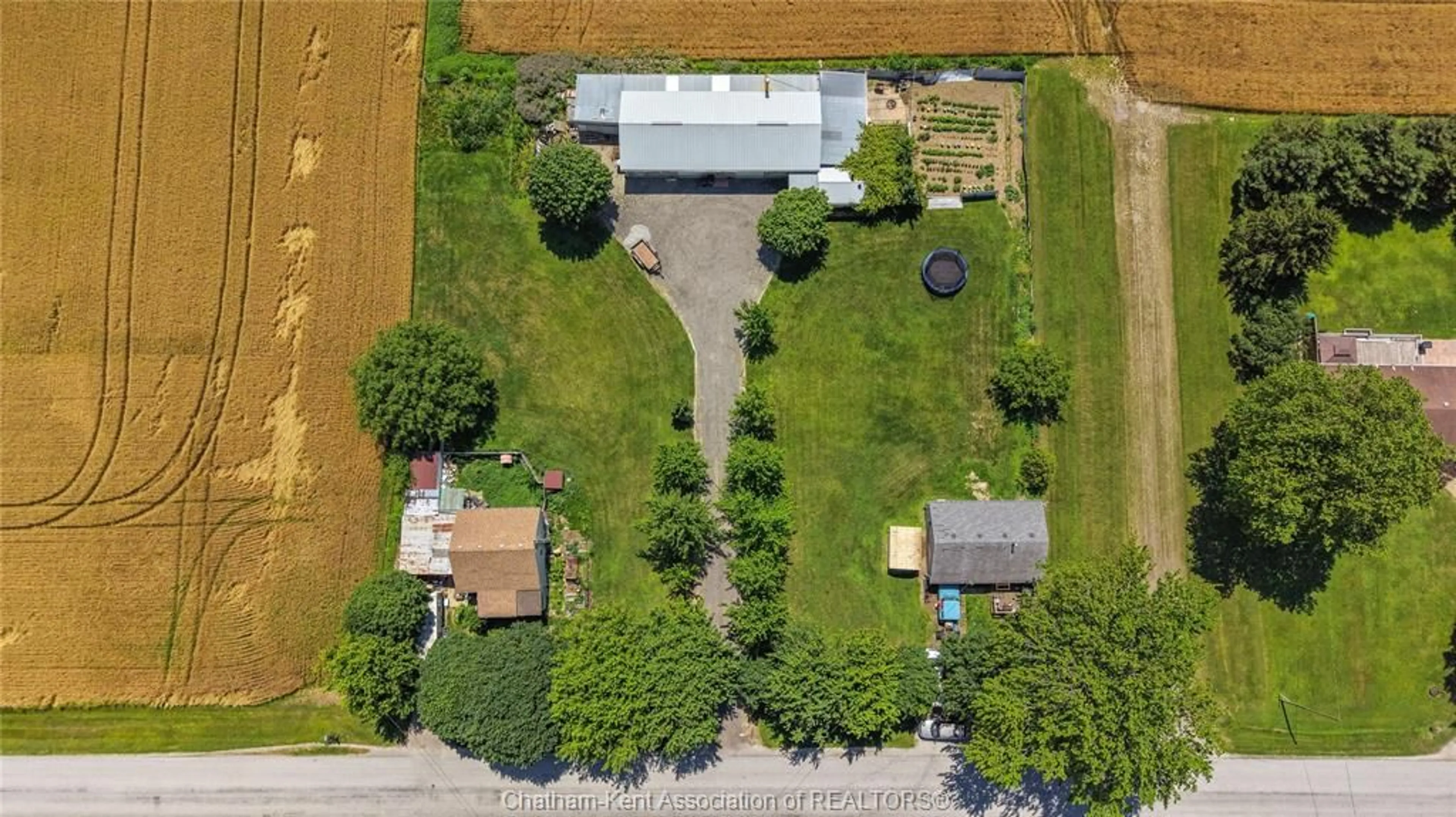 A pic from outside/outdoor area/front of a property/back of a property/a pic from drone, street for 8310/8320 SEVENTH Line, Chatham Ontario N7M 0L8