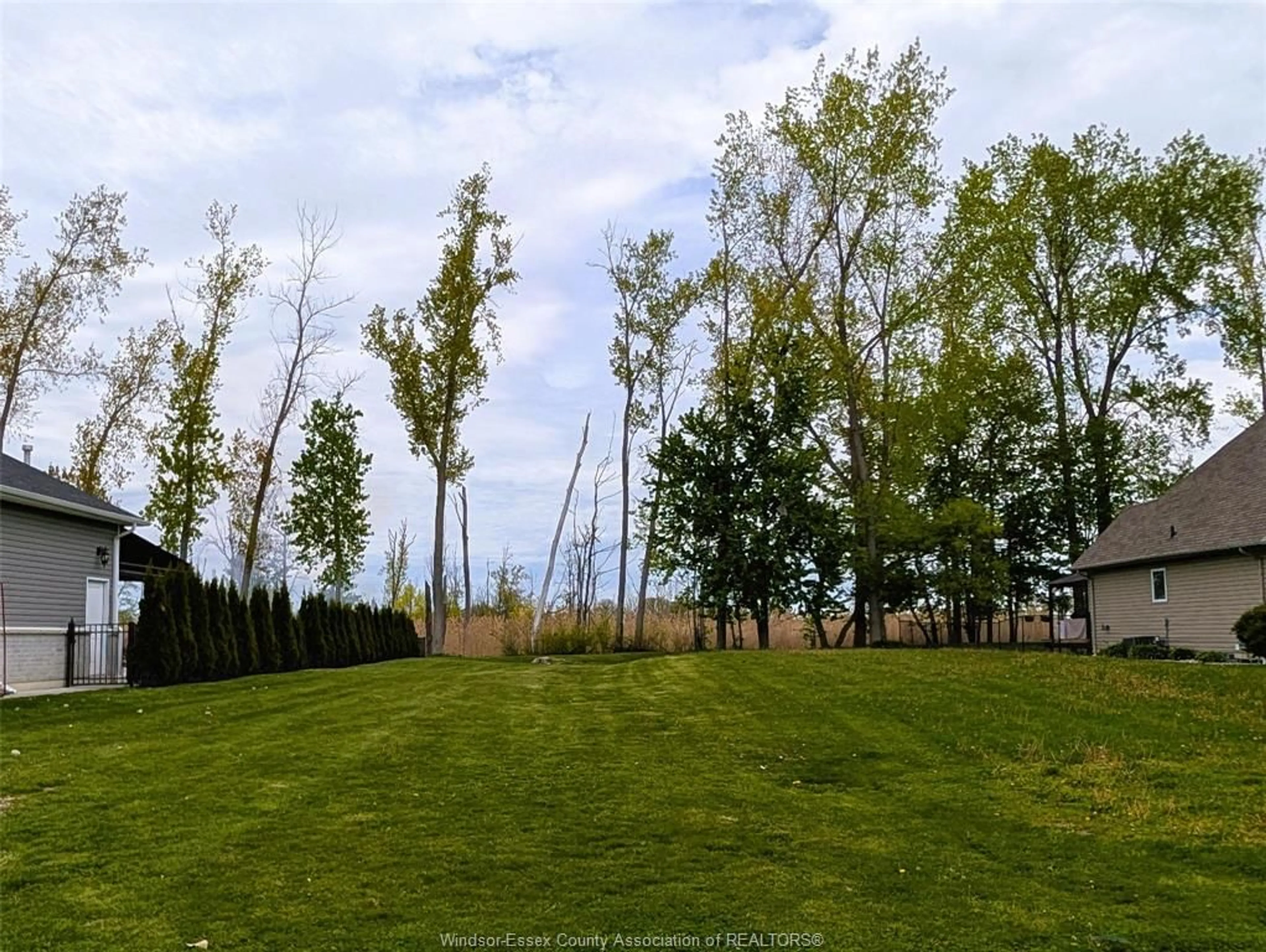 A pic from outside/outdoor area/front of a property/back of a property/a pic from drone, forest/trees view for V/L LAKEWOOD, Amherstburg Ontario N9V 2Y8