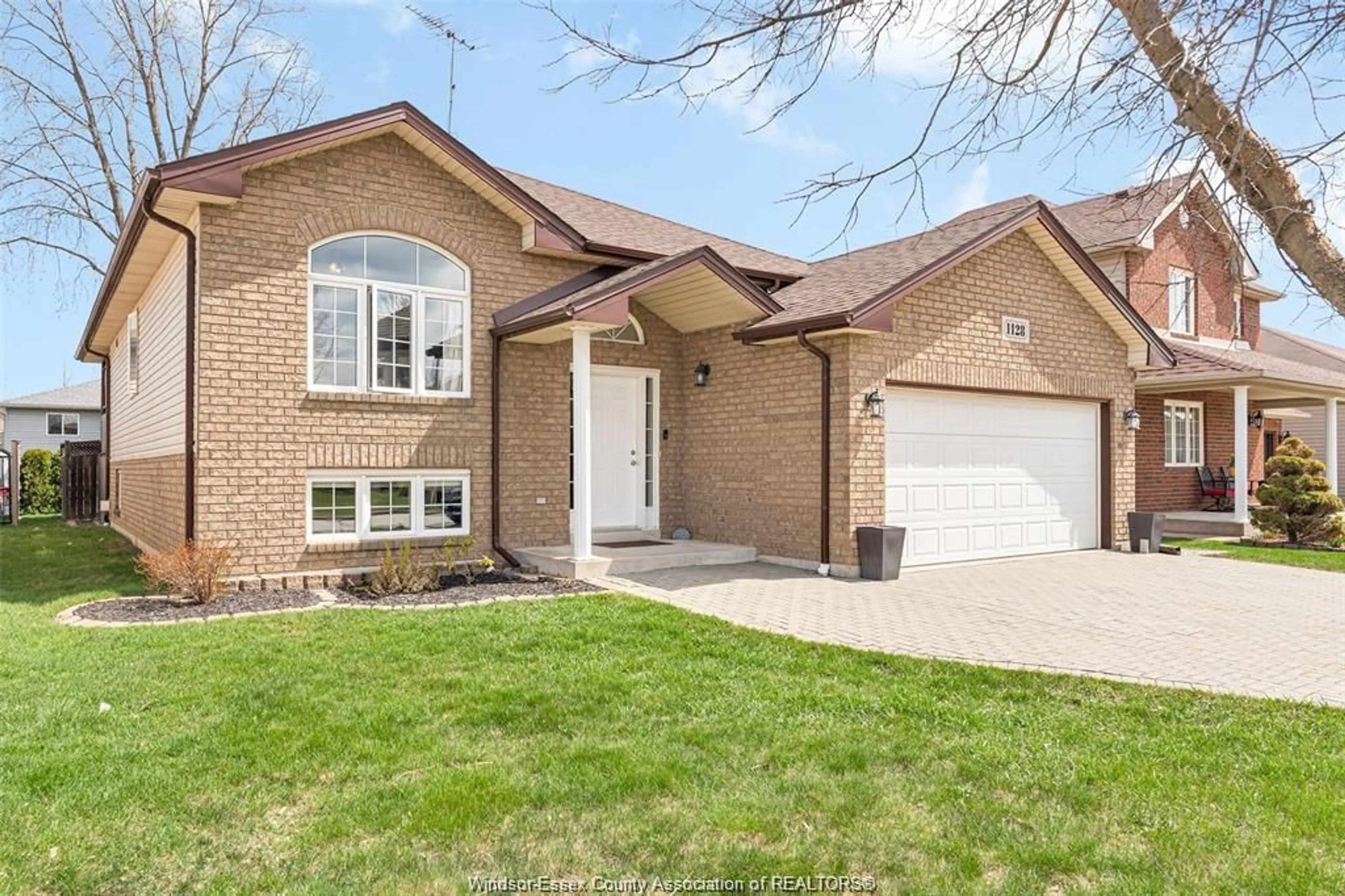 Home with brick exterior material, street for 1128 FREDERICA Ave, Windsor Ontario N8P 1V9