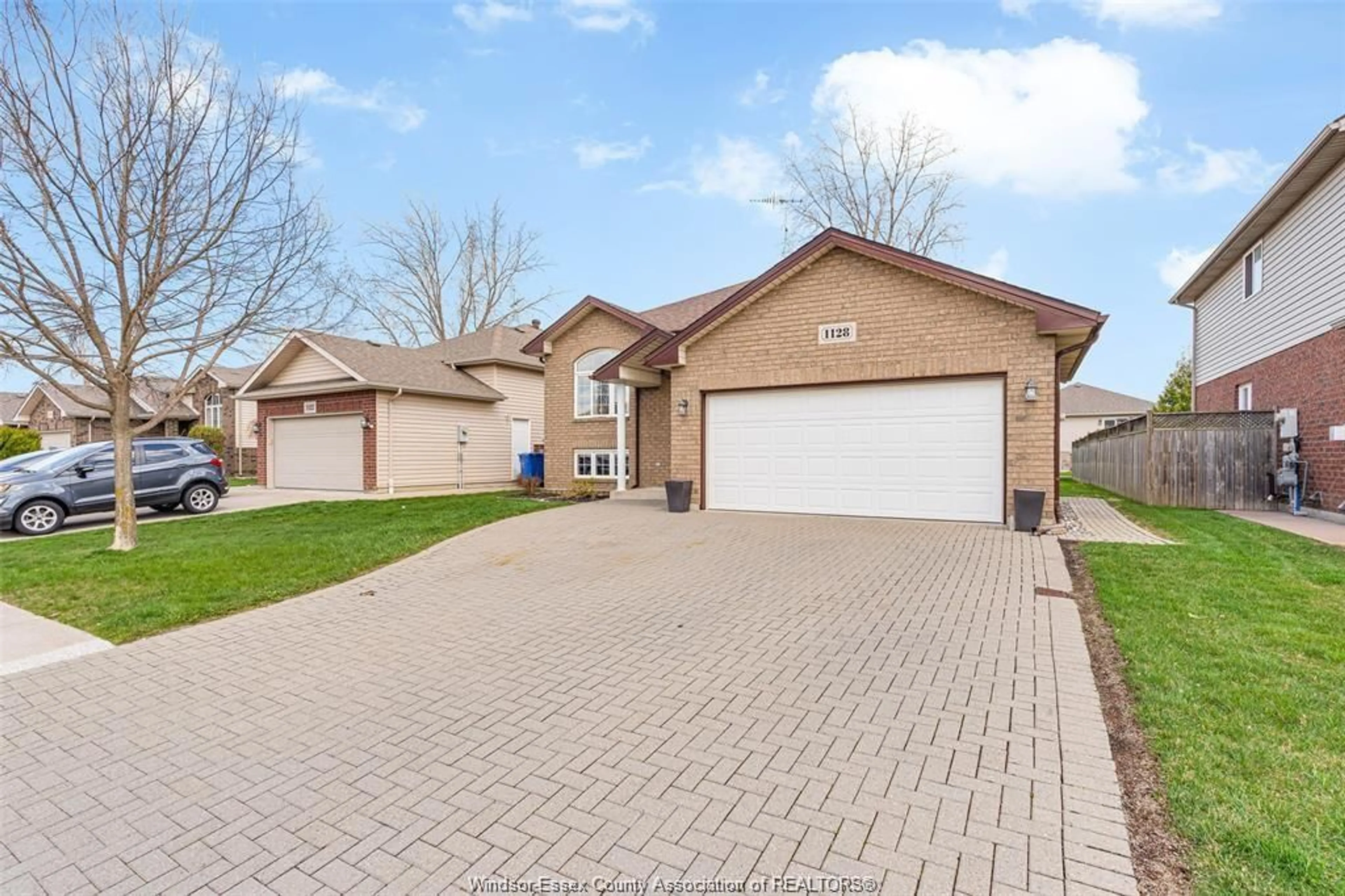 Home with brick exterior material, street for 1128 FREDERICA Ave, Windsor Ontario N8P 1V9