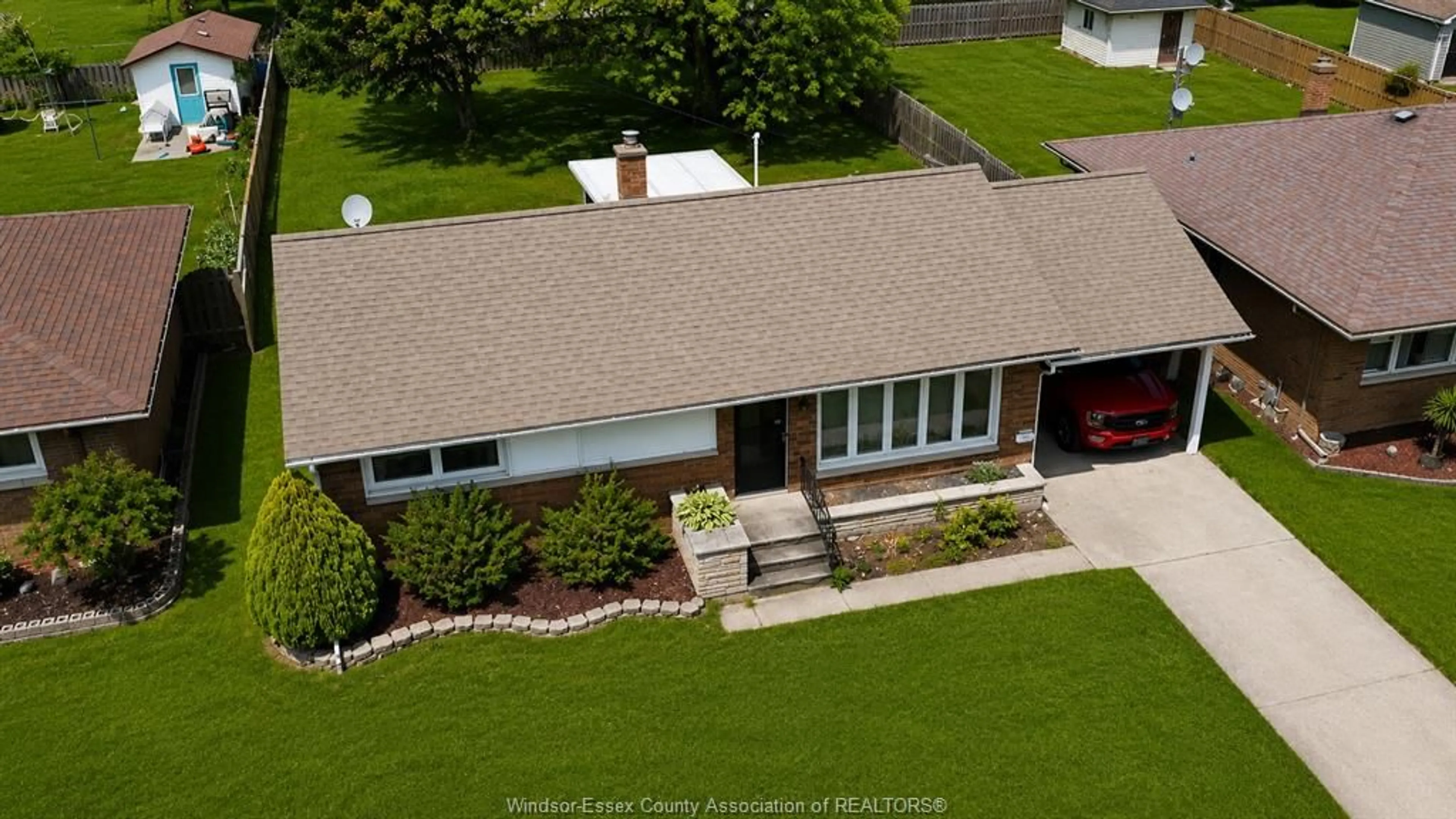 A pic from outside/outdoor area/front of a property/back of a property/a pic from drone, street for 5 Audrey St, Leamington Ontario N8H 2K7