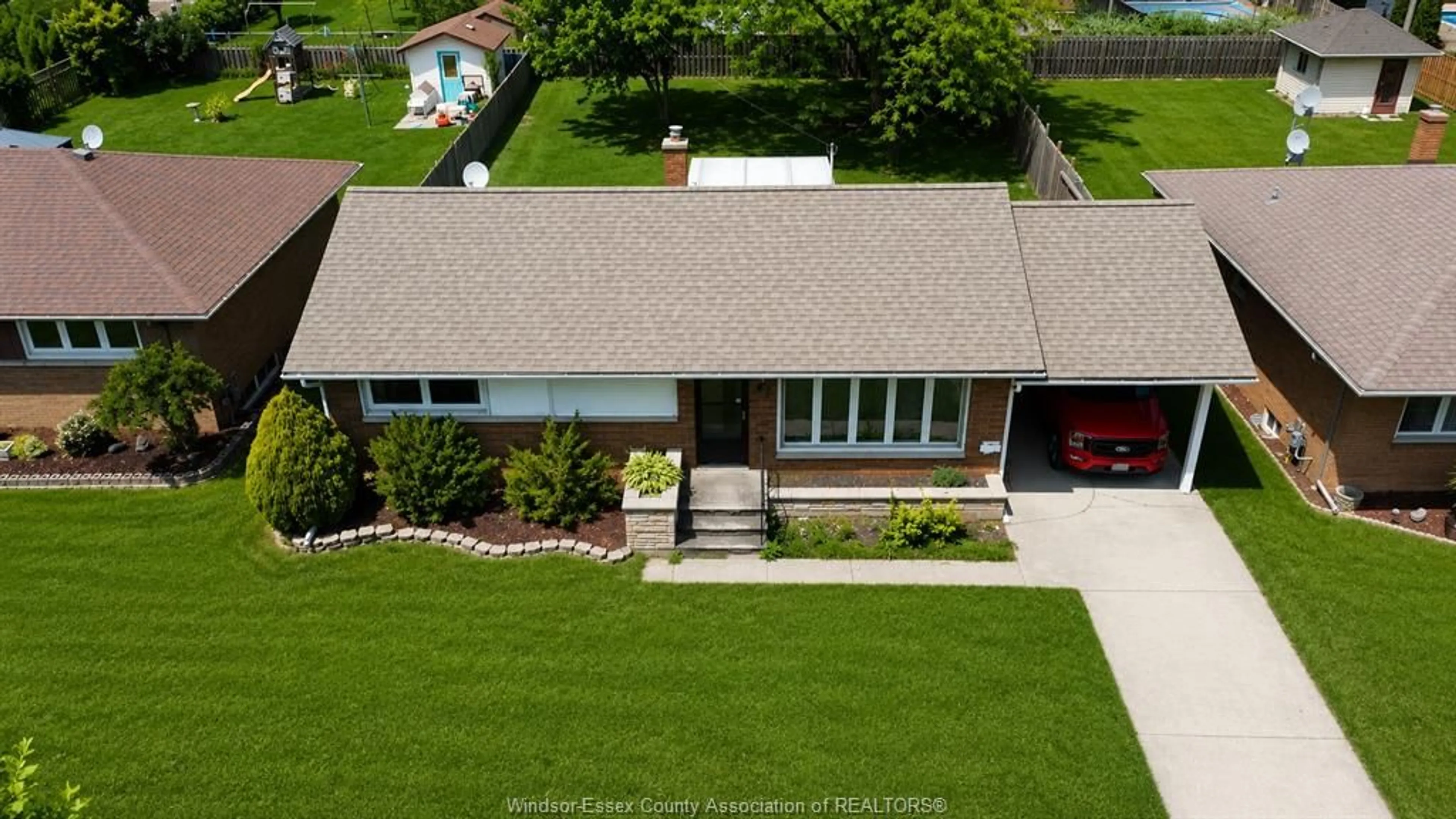 A pic from outside/outdoor area/front of a property/back of a property/a pic from drone, street for 5 Audrey St, Leamington Ontario N8H 2K7