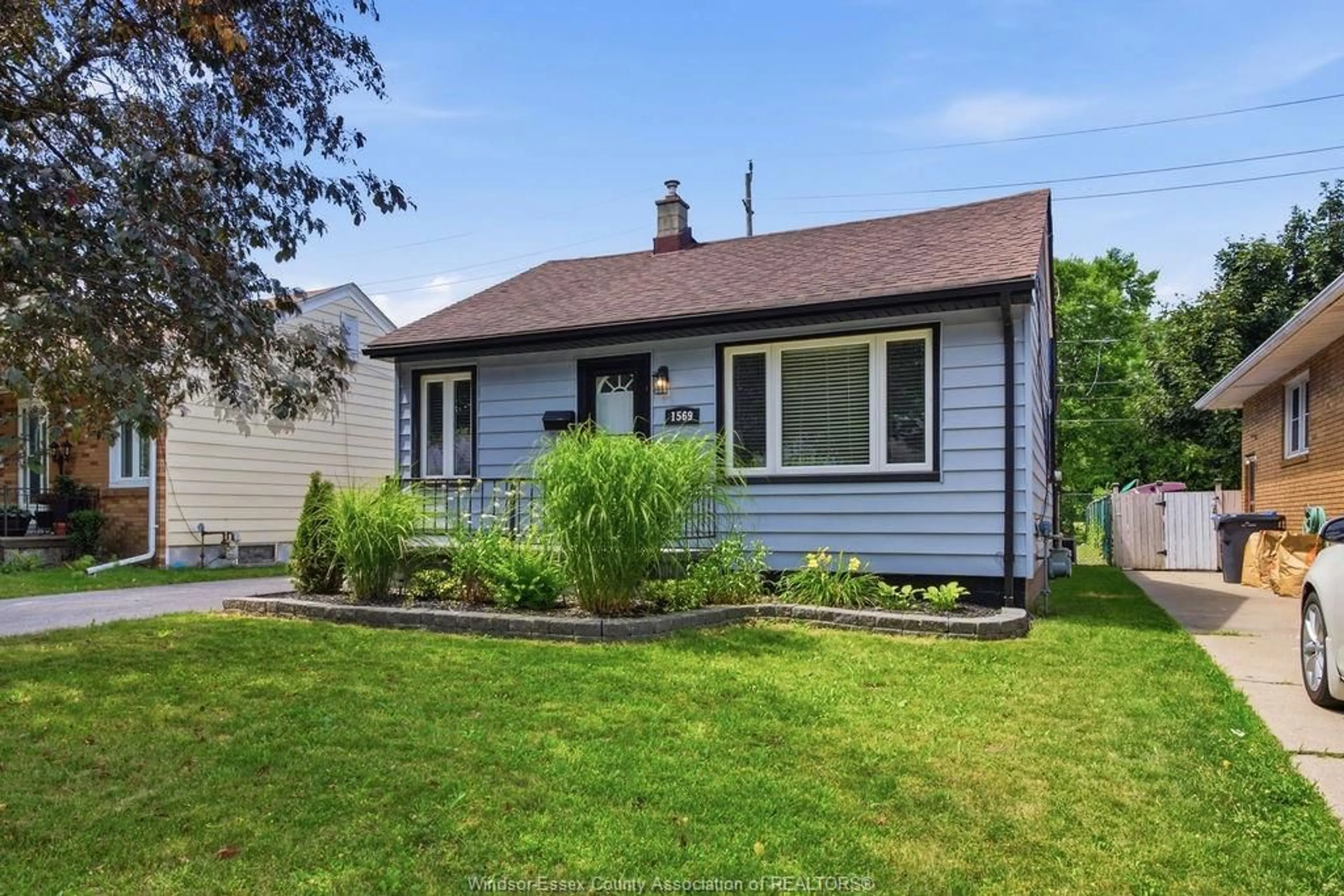 Home with vinyl exterior material, street for 1569 CENTRAL AVE, Windsor Ontario N8Y 2V7