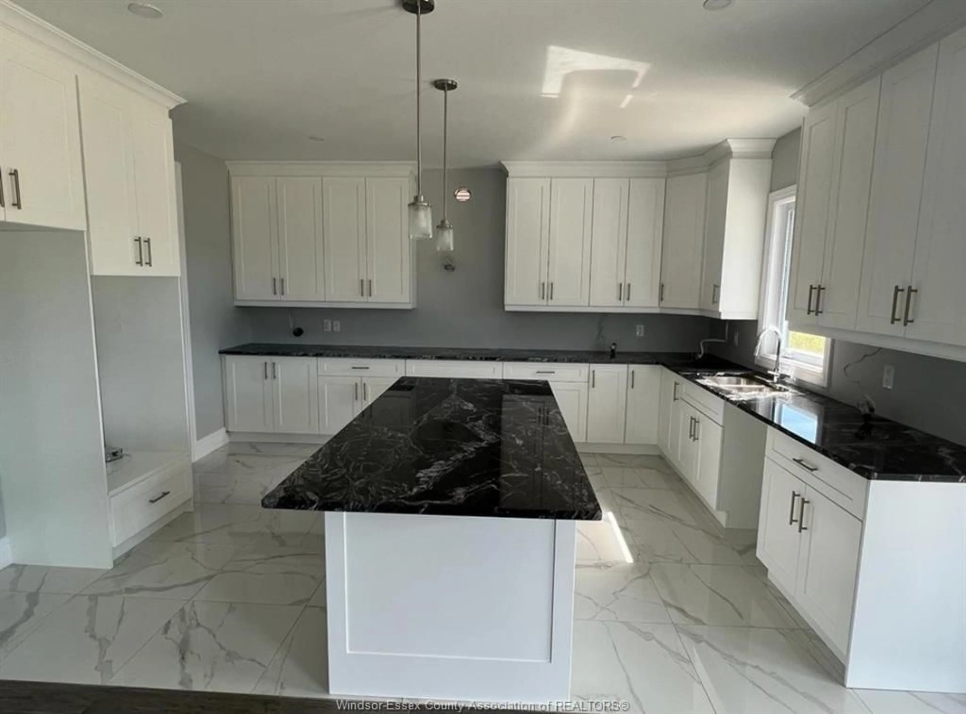 Open concept kitchen, ceramic/tile floor for 319 BENSON Crt, Amherstburg Ontario N9V 0G7