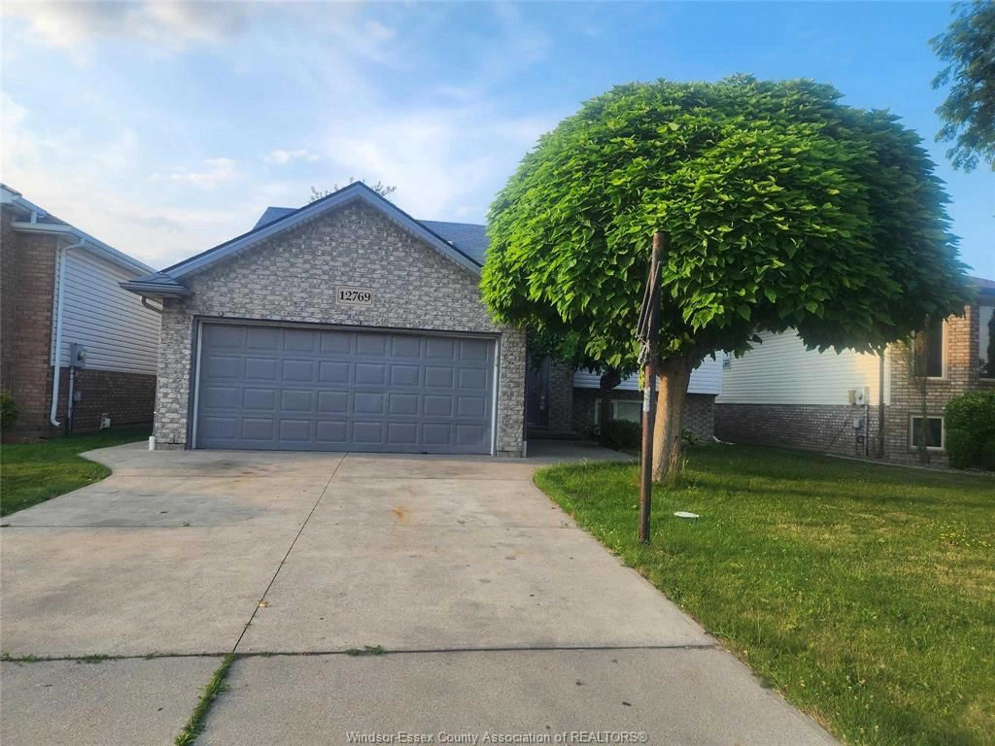 A pic from outside/outdoor area/front of a property/back of a property/a pic from drone, street for 12769 LEMIRE St, Tecumseh Ontario N8N 4V1