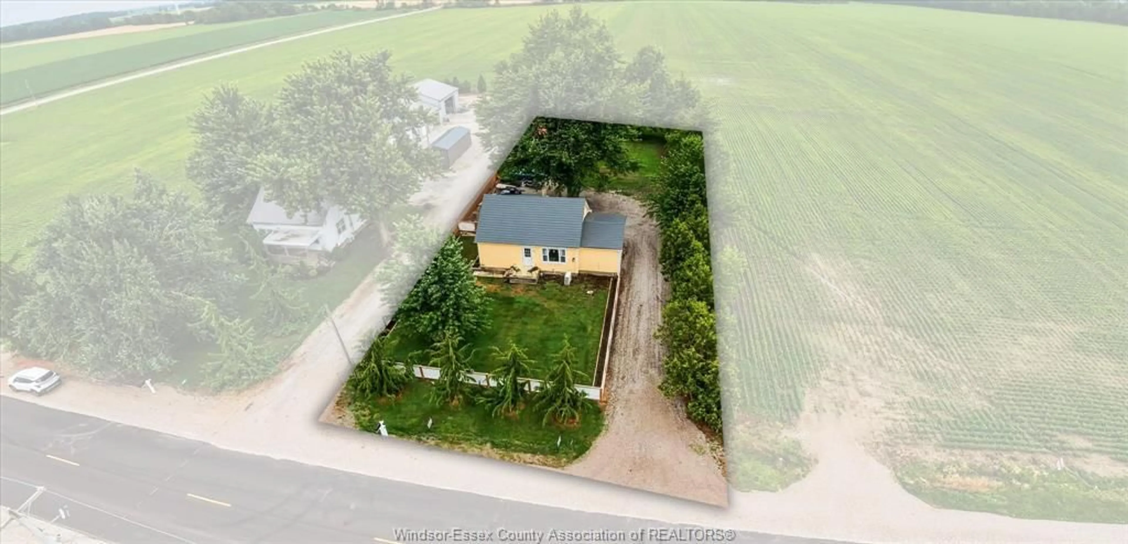 A pic from outside/outdoor area/front of a property/back of a property/a pic from drone, water/lake/river/ocean view for 9755 Gracey Side Road, Comber Ontario N0P 1J0