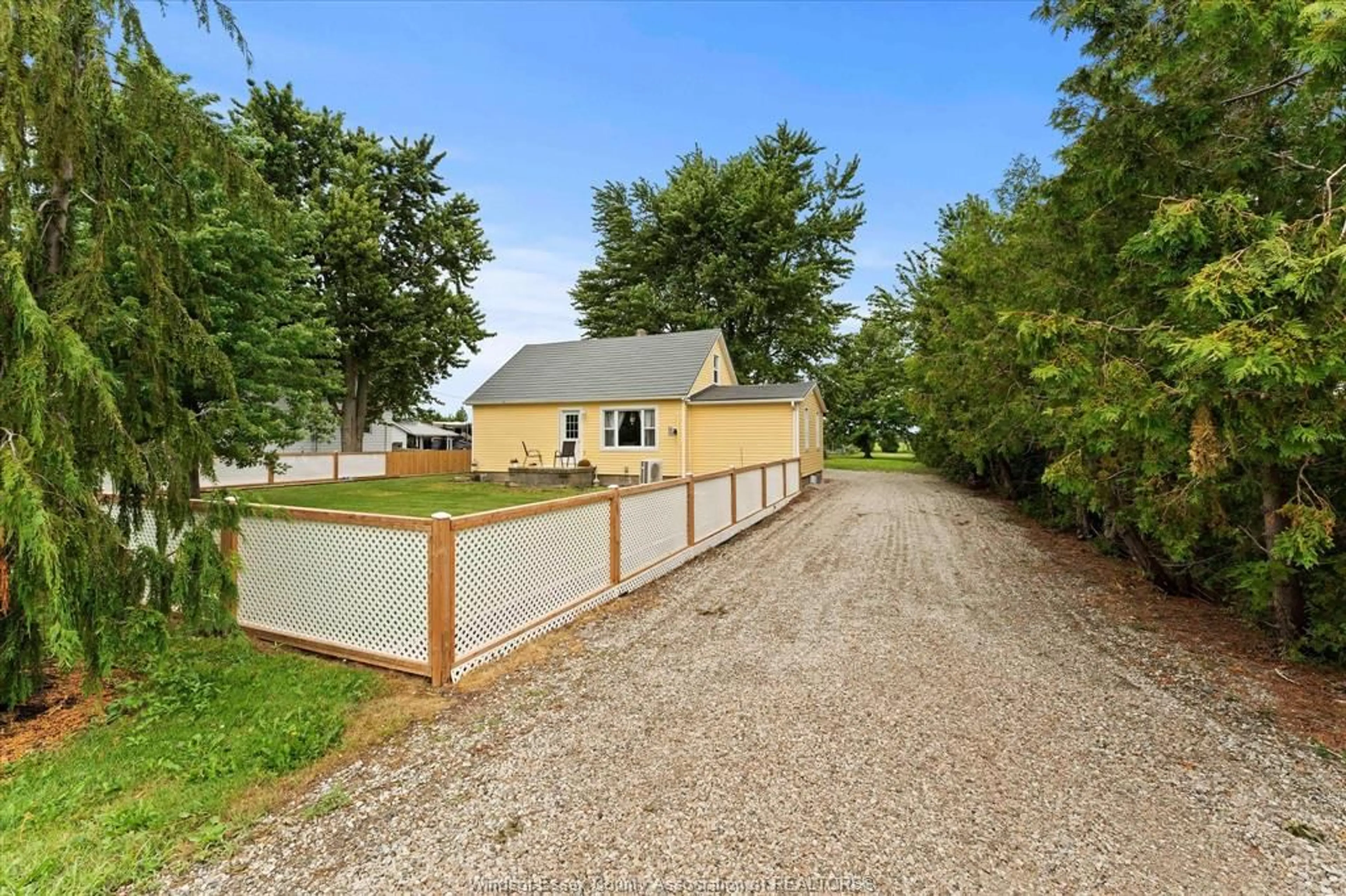 A pic from outside/outdoor area/front of a property/back of a property/a pic from drone, street for 9755 Gracey Side Road, Comber Ontario N0P 1J0