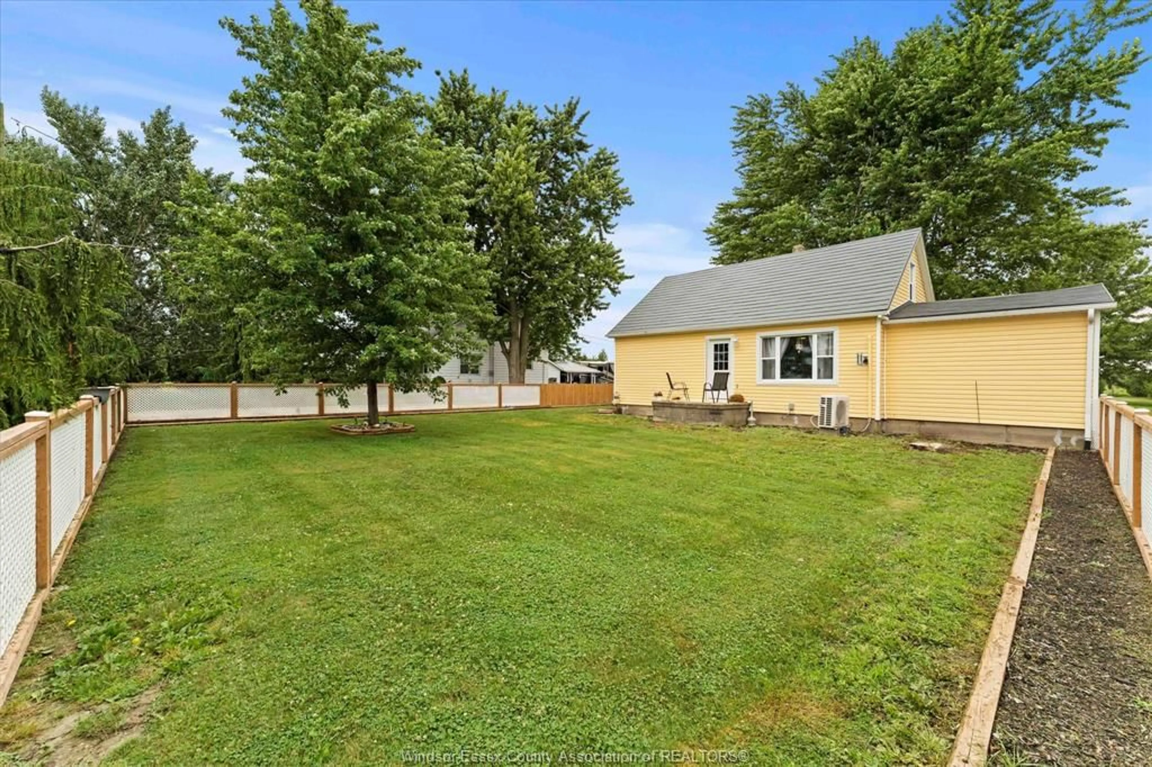 A pic from outside/outdoor area/front of a property/back of a property/a pic from drone, water/lake/river/ocean view for 9755 Gracey Side Road, Comber Ontario N0P 1J0